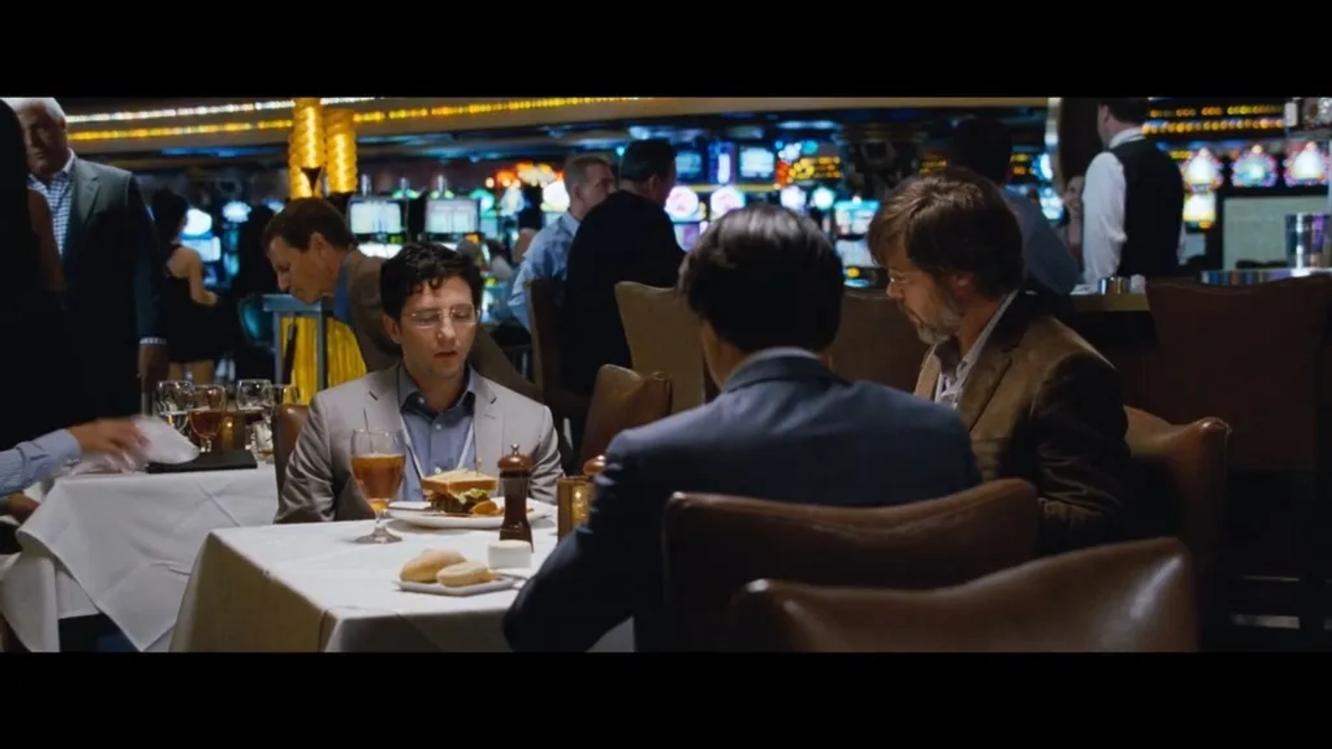 Brad Pitt, Finn Wittrock, and John Magaro in The Big Short (2015)