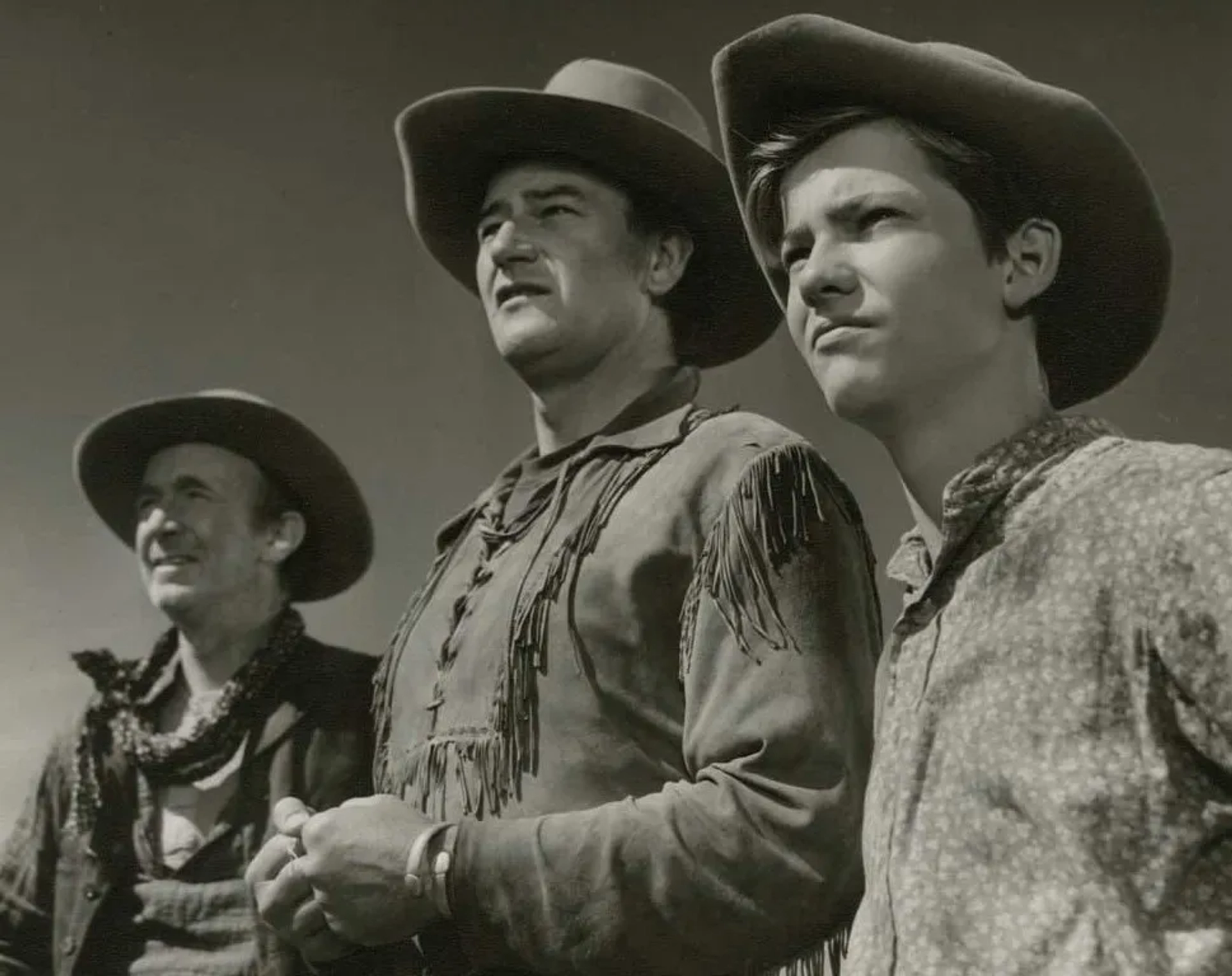 John Wayne, Walter Brennan, and Mickey Kuhn in Red River (1948)