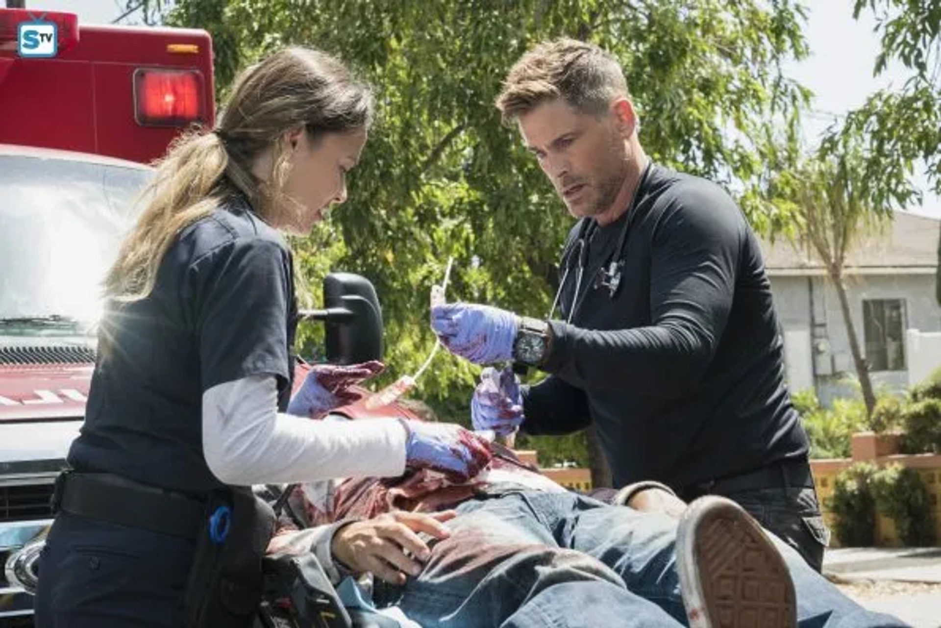 Rob Lowe and Moon Bloodgood in Code Black (2015)