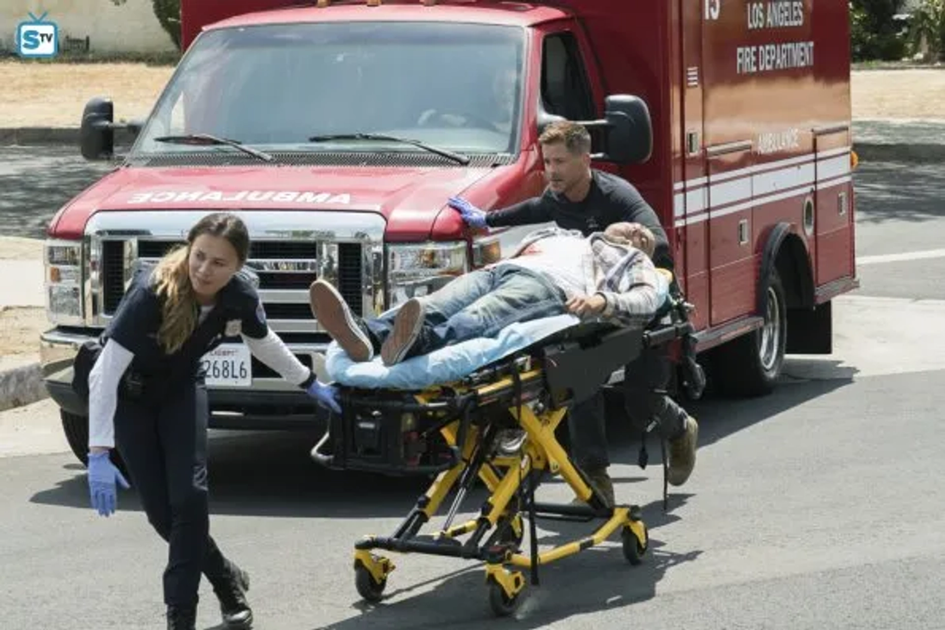 Rob Lowe and Moon Bloodgood in Code Black (2015)