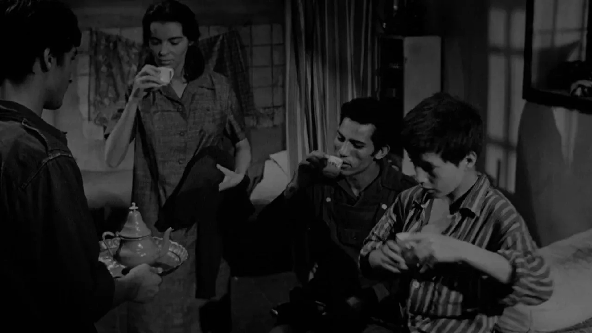 Mohamed Ben Kassen, Fouzia El Kader, Brahim Hadjadj, and Franco Moruzzi in The Battle of Algiers (1966)