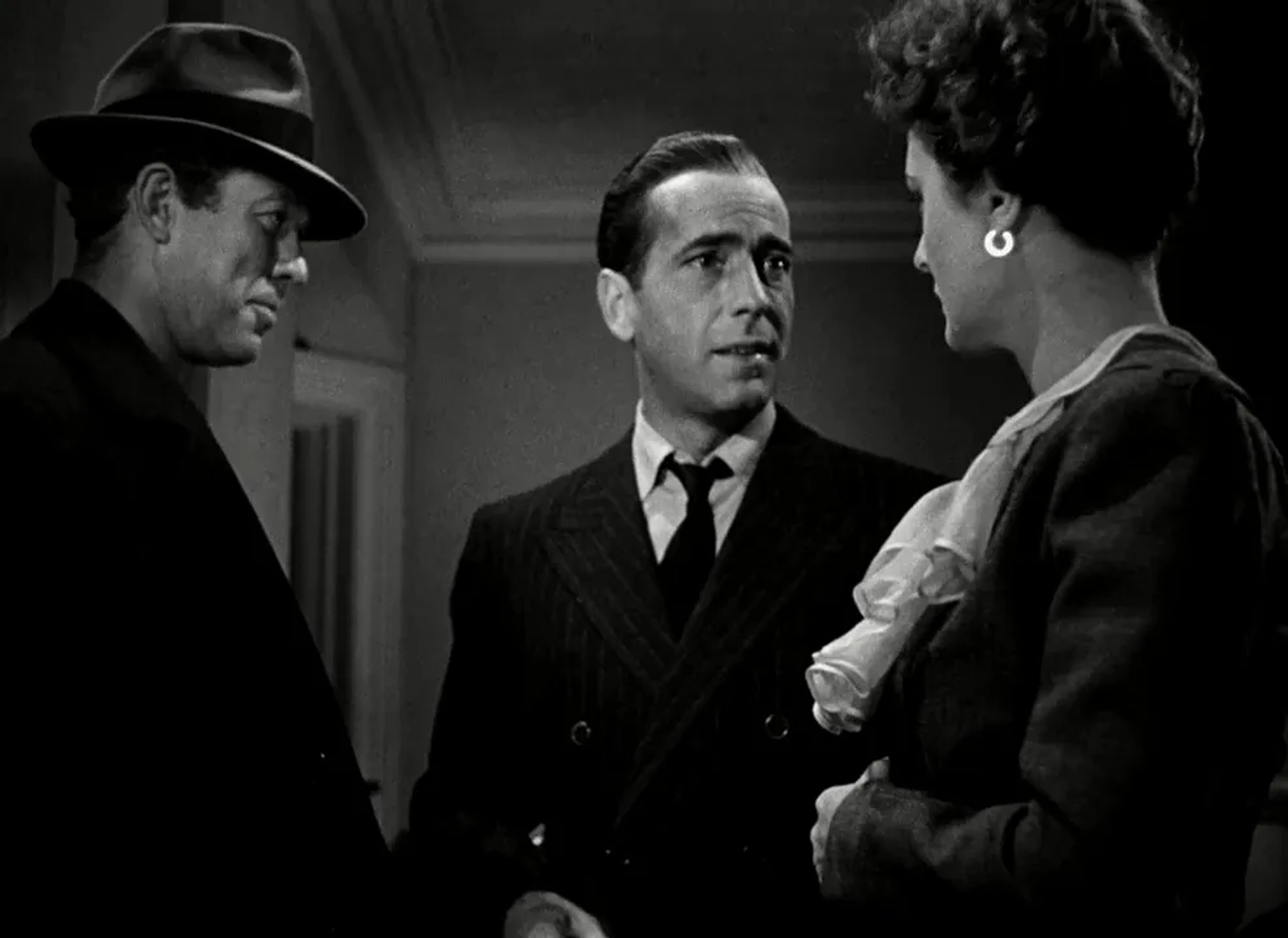 Humphrey Bogart, Mary Astor, and Ward Bond in The Maltese Falcon (1941)