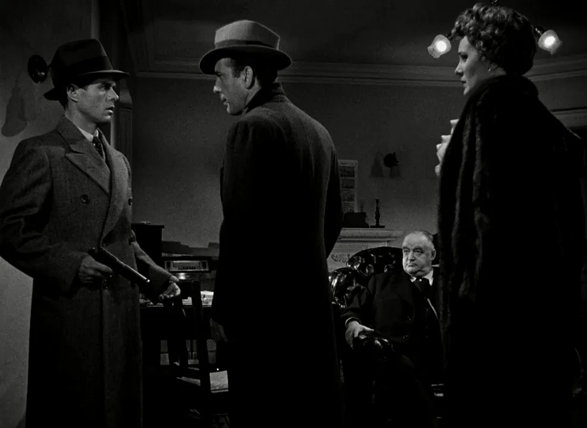 Humphrey Bogart, Mary Astor, Sydney Greenstreet, and Elisha Cook Jr. in The Maltese Falcon (1941)