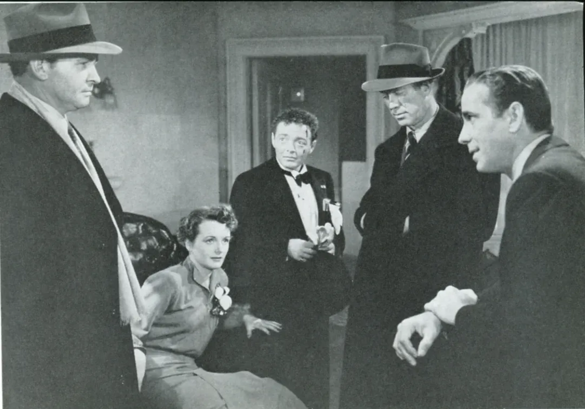 Humphrey Bogart, Peter Lorre, Mary Astor, Ward Bond, and Barton MacLane in The Maltese Falcon (1941)