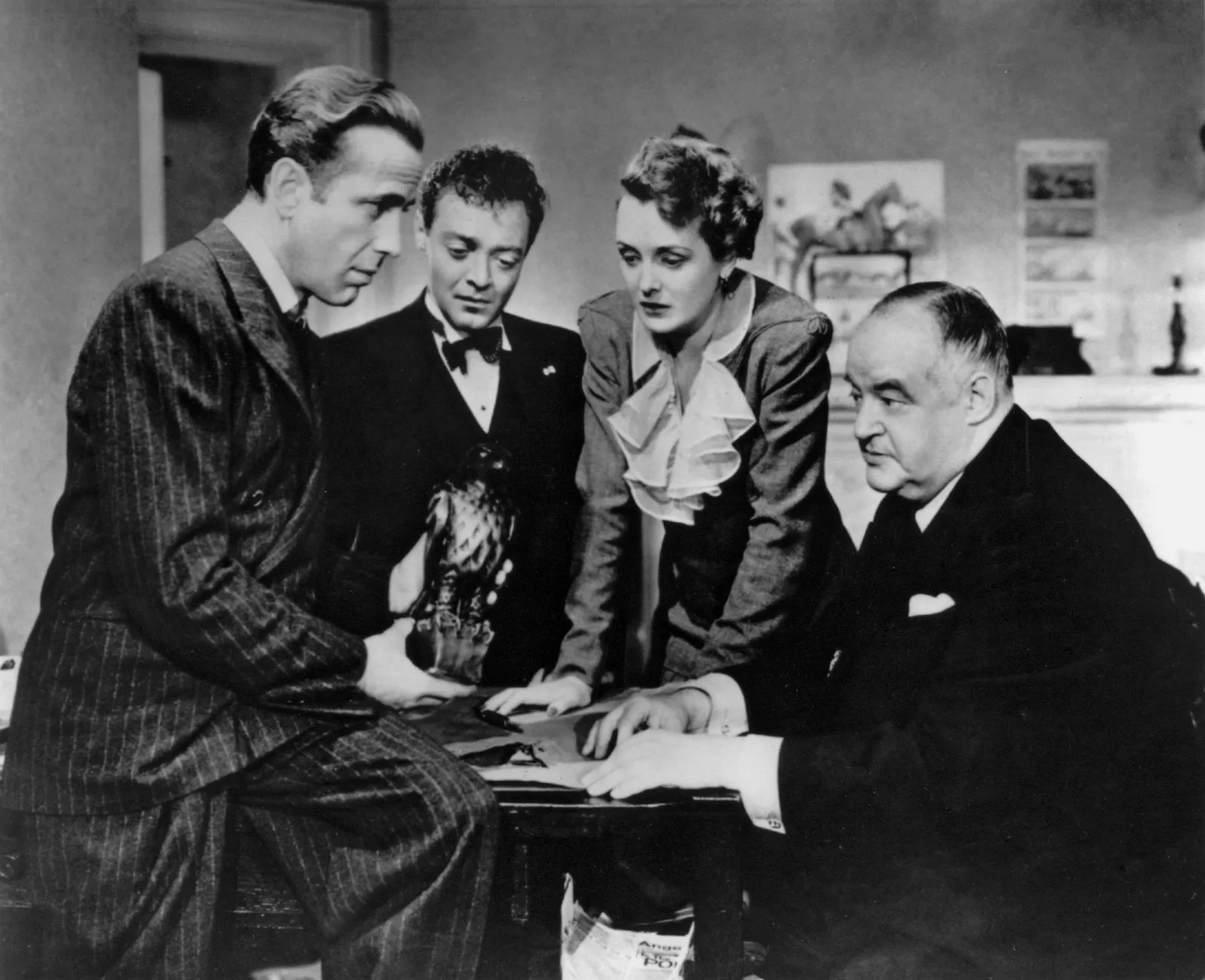 Humphrey Bogart, Peter Lorre, Mary Astor, and Sydney Greenstreet in The Maltese Falcon (1941)