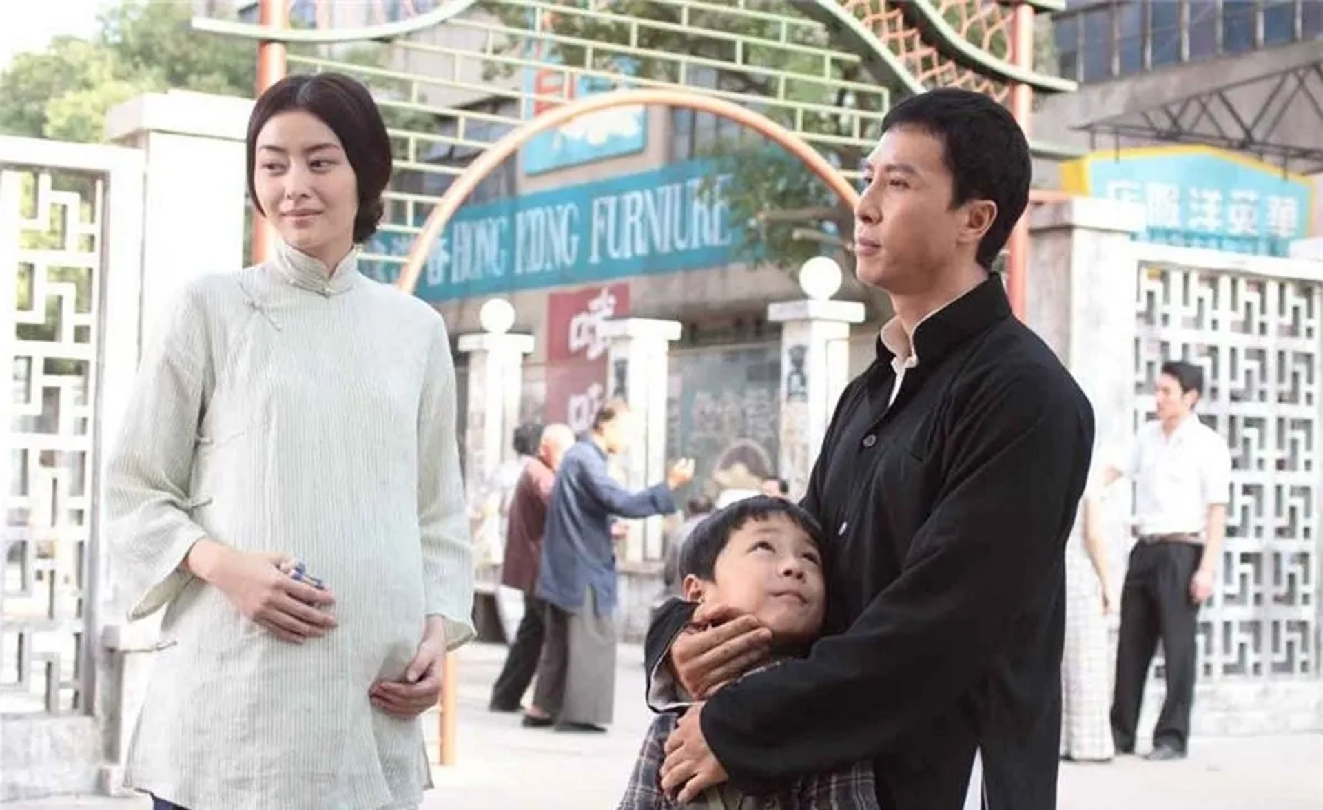 Donnie Yen, Lynn Xiong, and Li Chak in Ip Man 2 (2010)