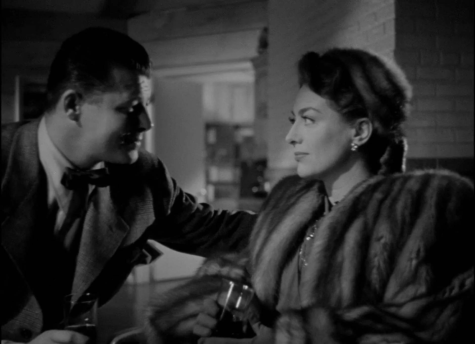 Joan Crawford and Jack Carson in Mildred Pierce (1945)