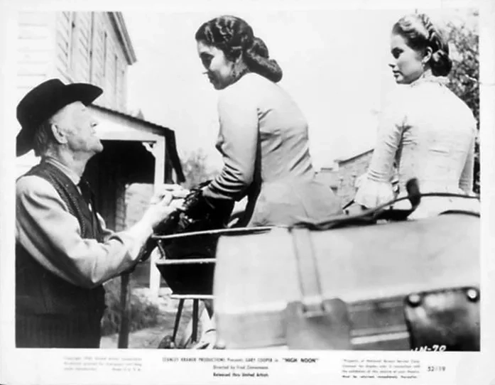 Grace Kelly, Tom London, and Katy Jurado in High Noon (1952)