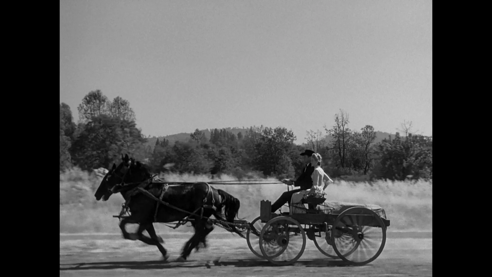 Gary Cooper and Grace Kelly in High Noon (1952)