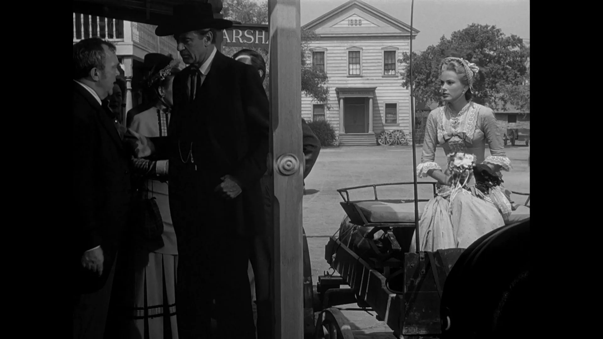 Gary Cooper, Grace Kelly, and Thomas Mitchell in High Noon (1952)