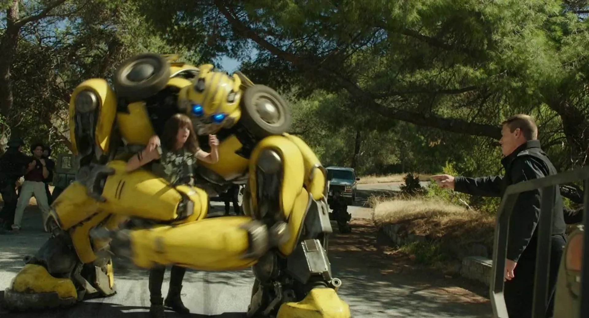 John Cena, Hailee Steinfeld, and Dylan O'Brien in Bumblebee (2018)