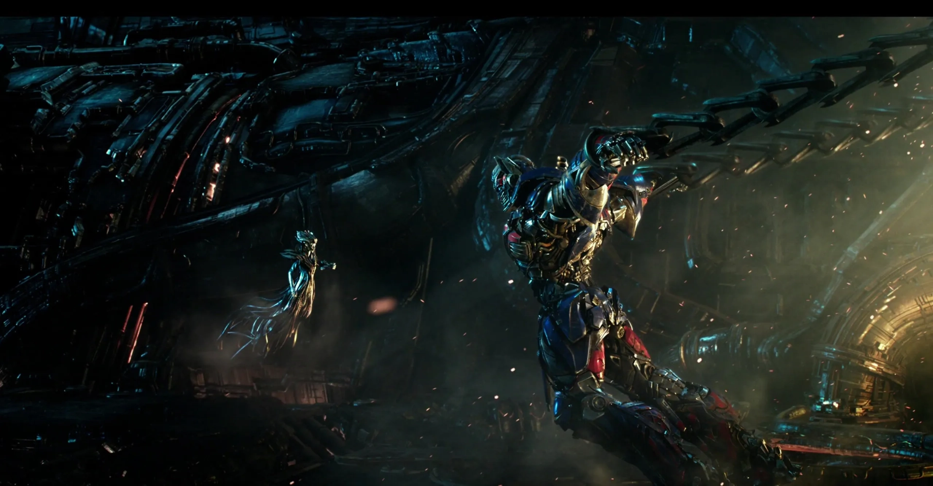 Peter Cullen and Gemma Chan in Transformers: The Last Knight (2017)