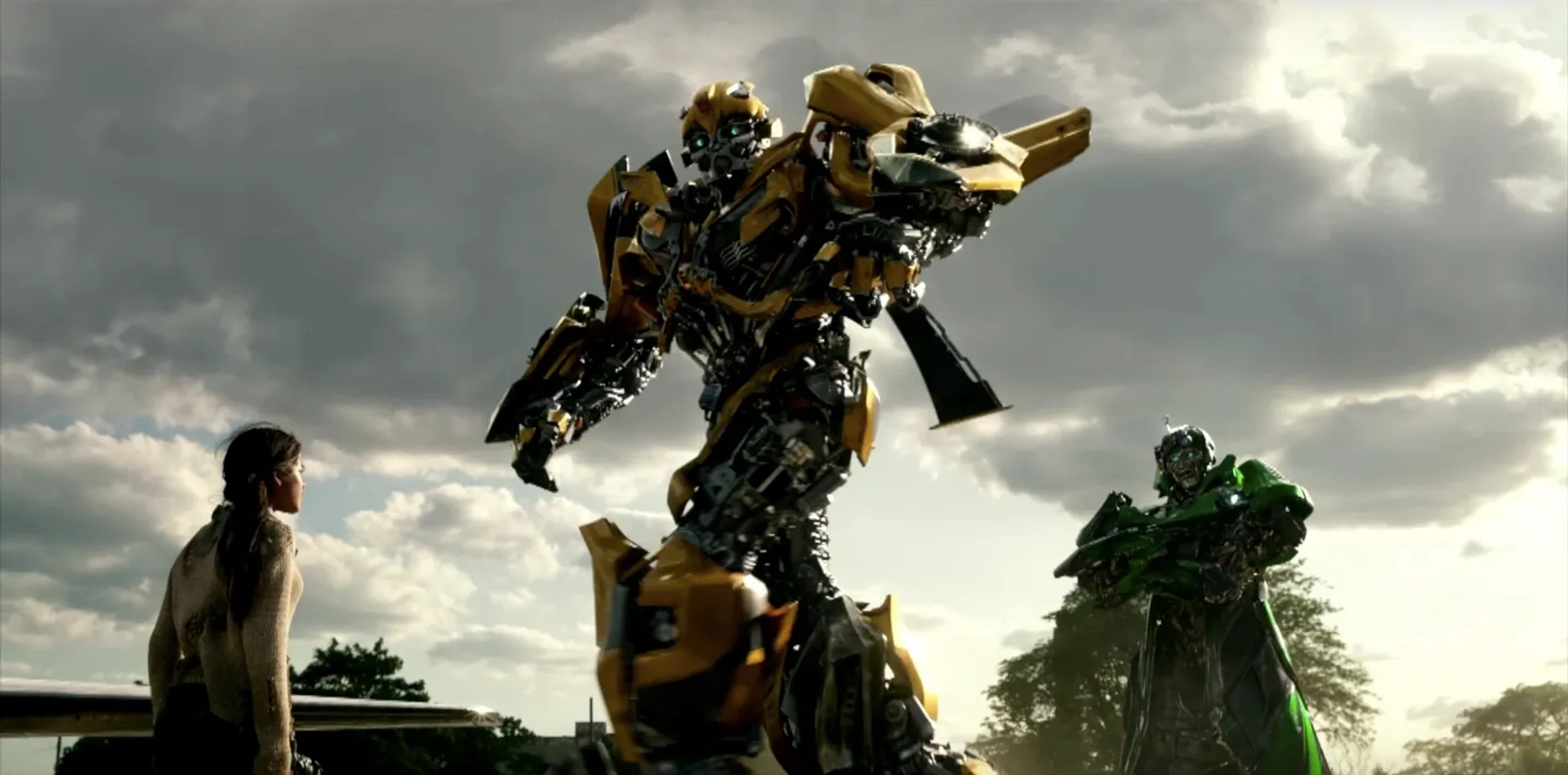 Erik Aadahl, John DiMaggio, and Isabela Merced in Transformers: The Last Knight (2017)