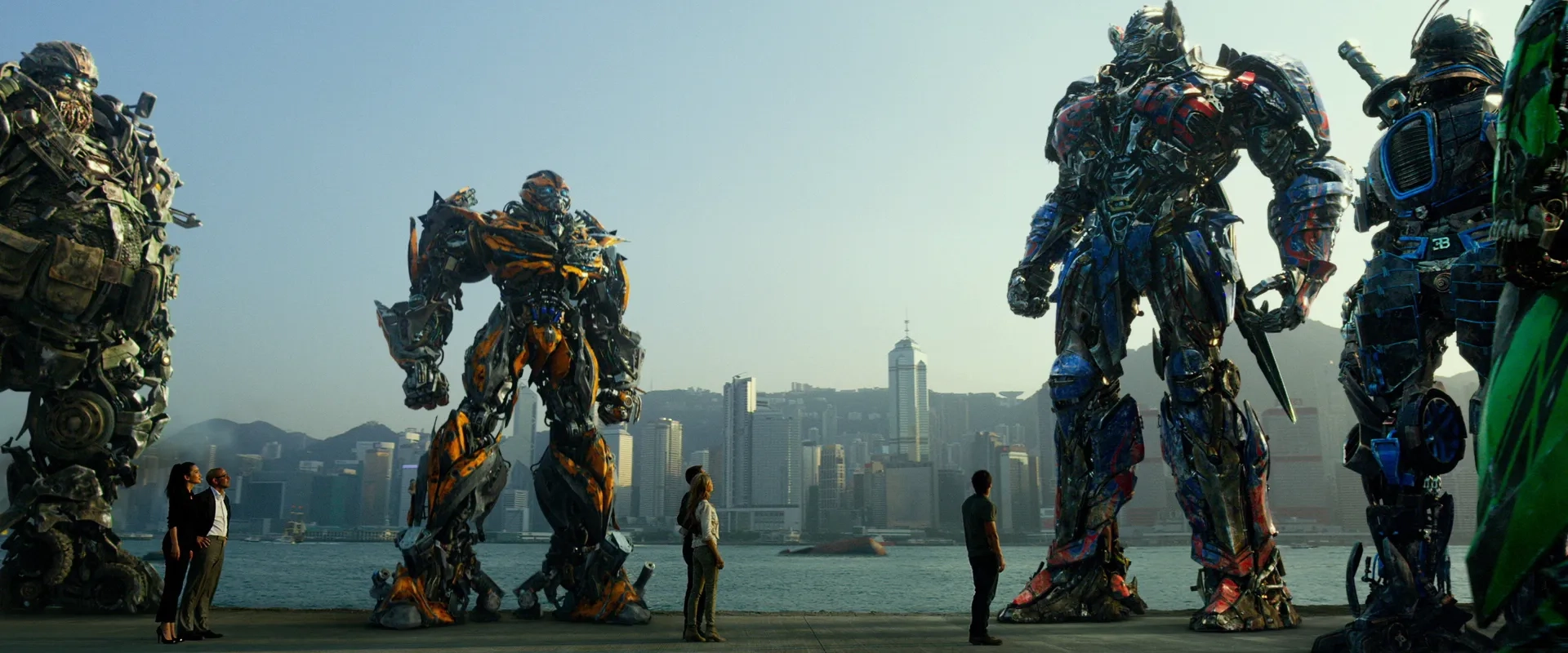 Mark Wahlberg, John Goodman, Stanley Tucci, Peter Cullen, John DiMaggio, Bingbing Li, Ken Watanabe, Nicola Peltz Beckham, and Jack Reynor in Transformers: Age of Extinction (2014)