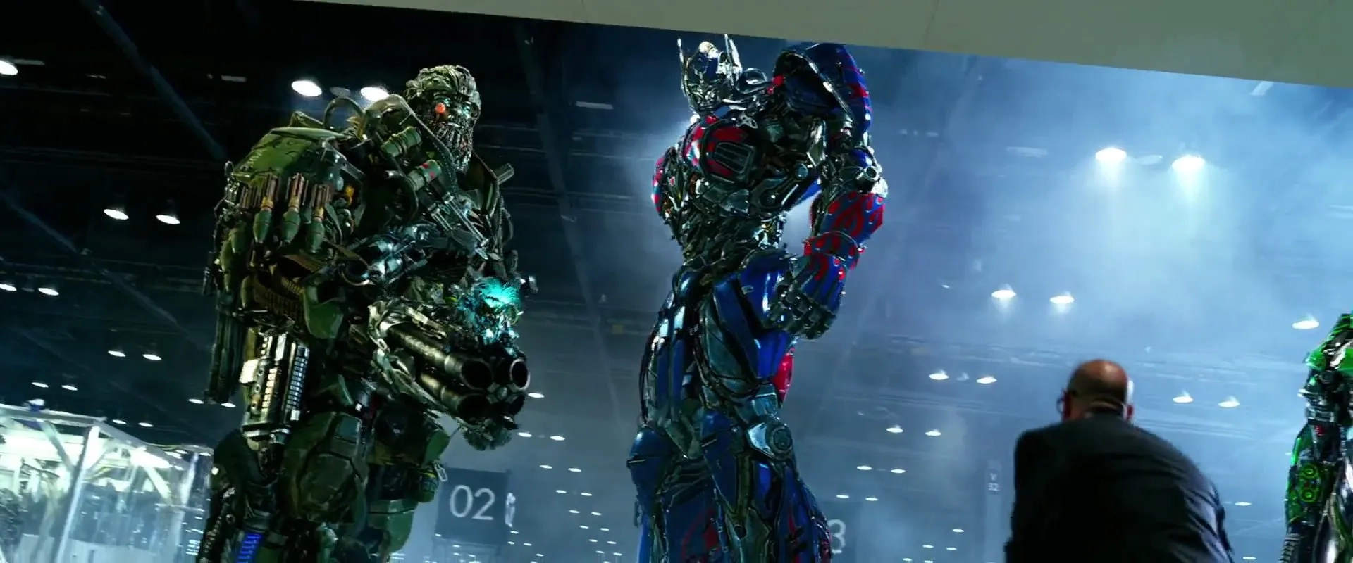 John Goodman, Stanley Tucci, Peter Cullen, and John DiMaggio in Transformers: Age of Extinction (2014)