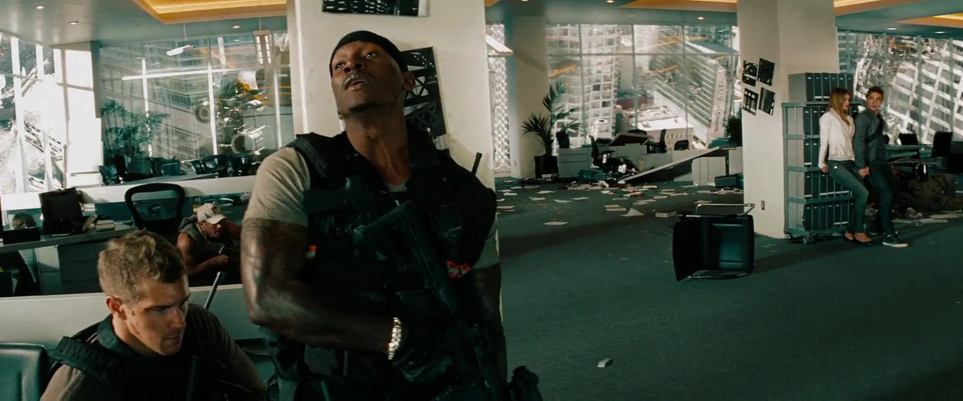 Shia LaBeouf, Tyrese Gibson, and Rosie Huntington-Whiteley in Transformers: Dark of the Moon (2011)