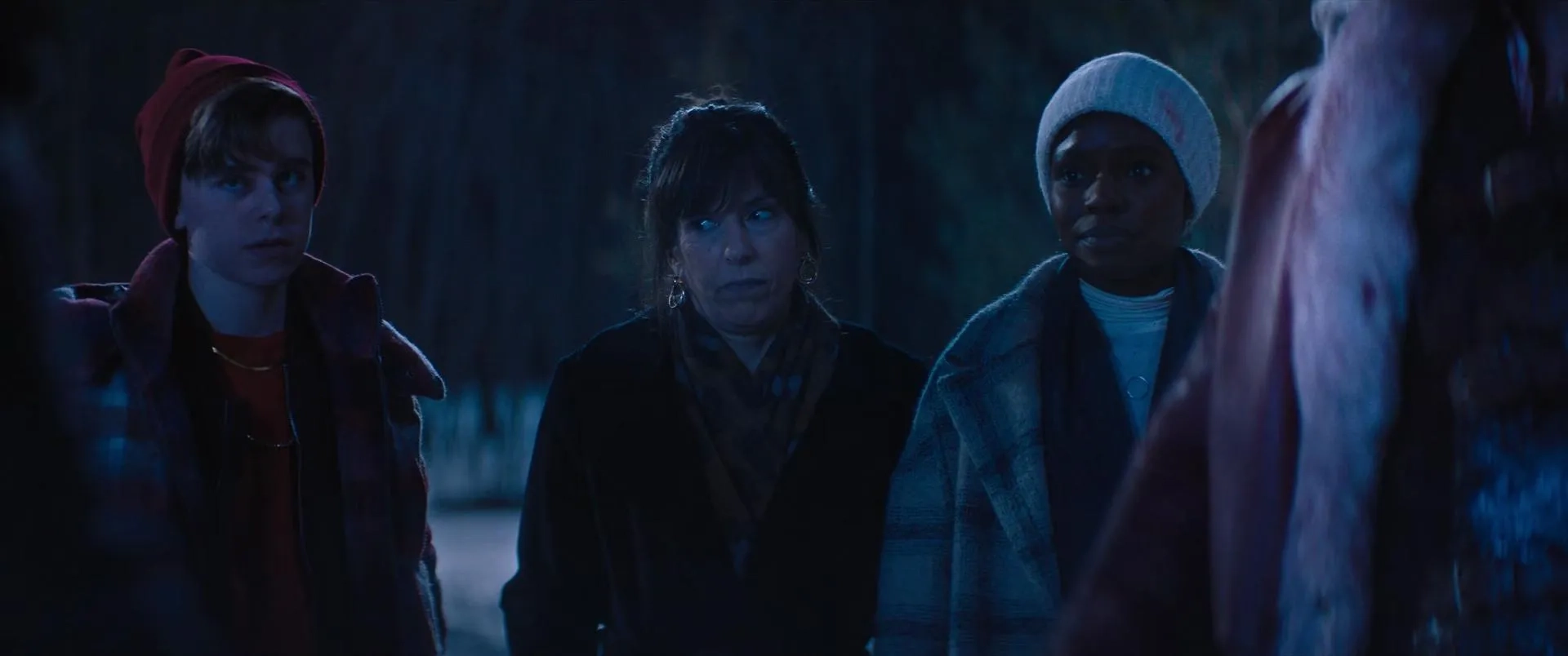 Edi Patterson, Alexander Elliot, and Alexis Louder in Violent Night (2022)