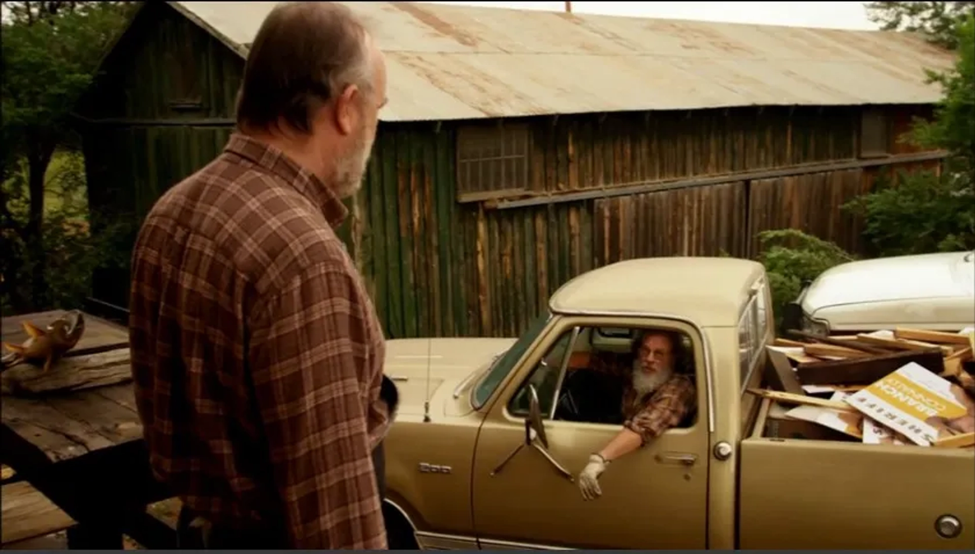 Martin Palmer and Jim Beaver in a scene from Longmire "Natural Order"