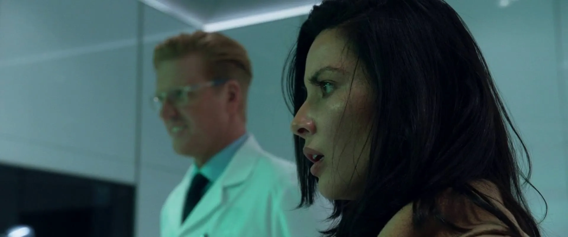 Jake Busey and Olivia Munn in The Predator (2018)