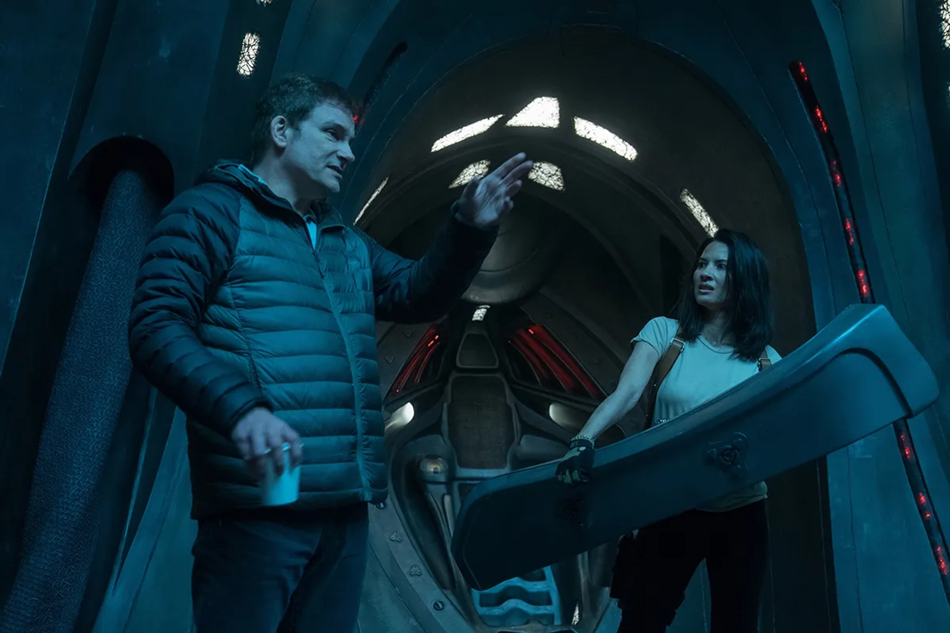 Shane Black and Olivia Munn in The Predator (2018)