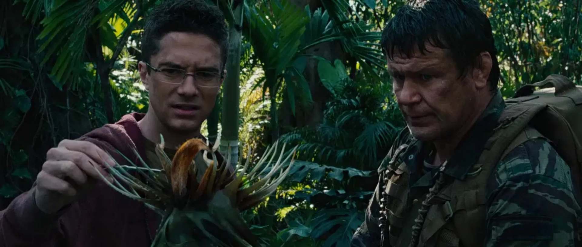 Topher Grace and Oleg Taktarov in Predators (2010)