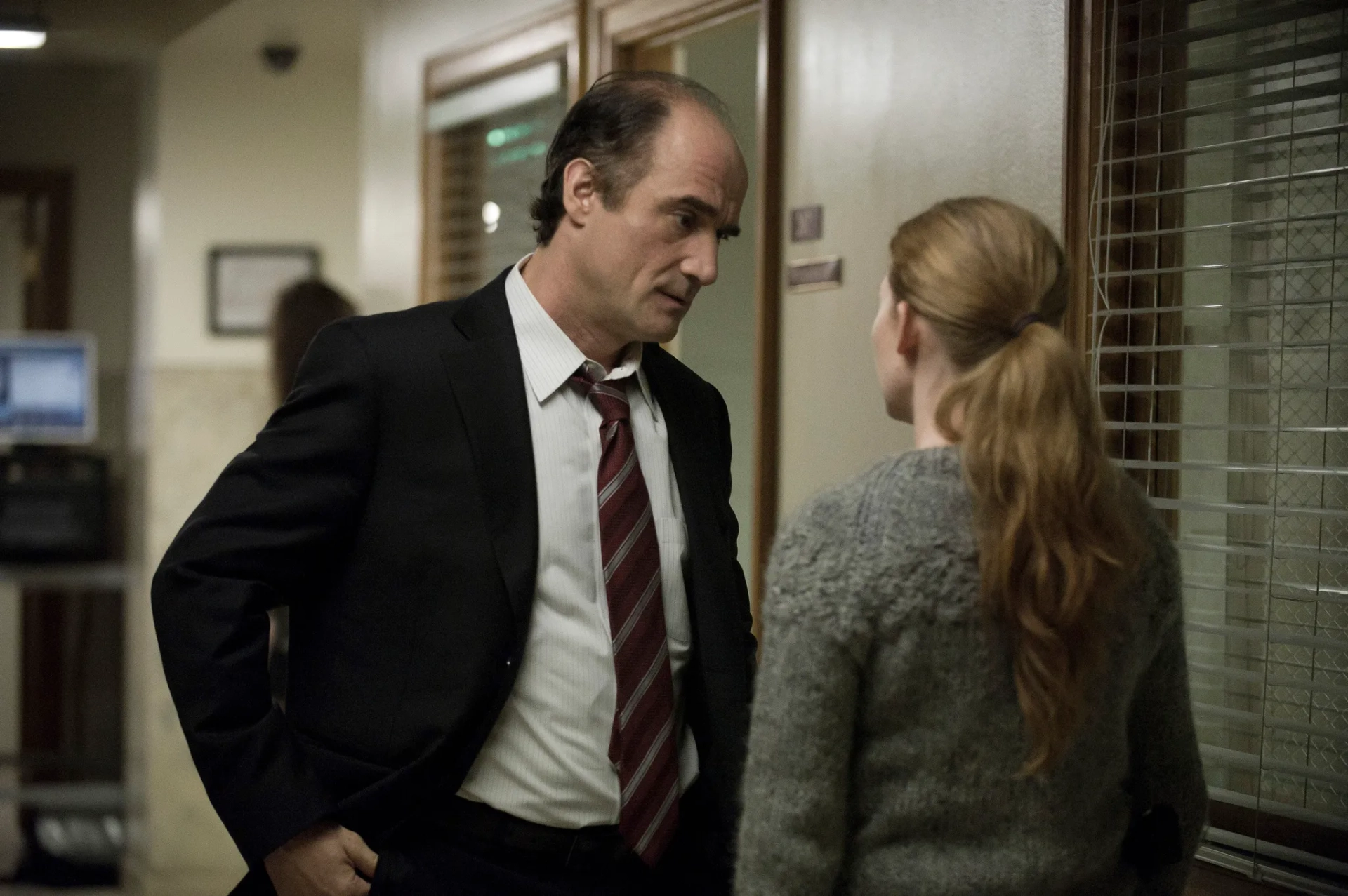 Elias Koteas and Mireille Enos in The Killing (2011)