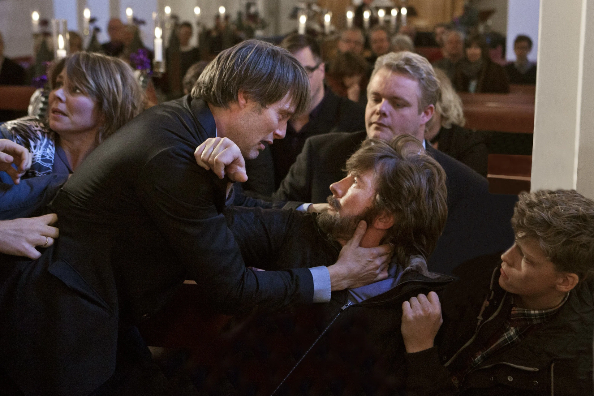 Anne Louise Hassing, Thomas Bo Larsen, Mads Mikkelsen, Daniel Engstrup, and Sebastian Bull in The Hunt (2012)