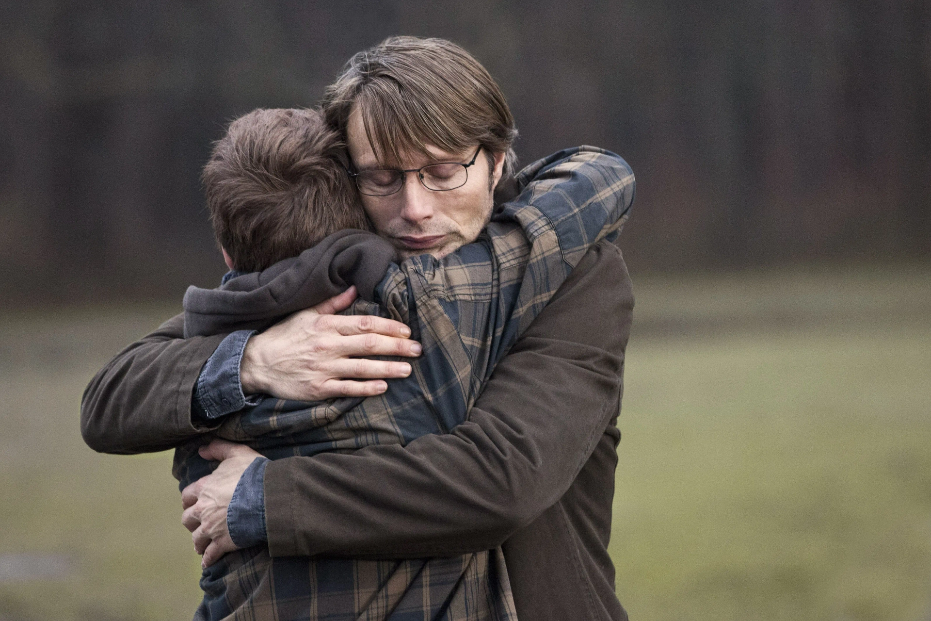 Mads Mikkelsen and Lasse Fogelstrøm in The Hunt (2012)