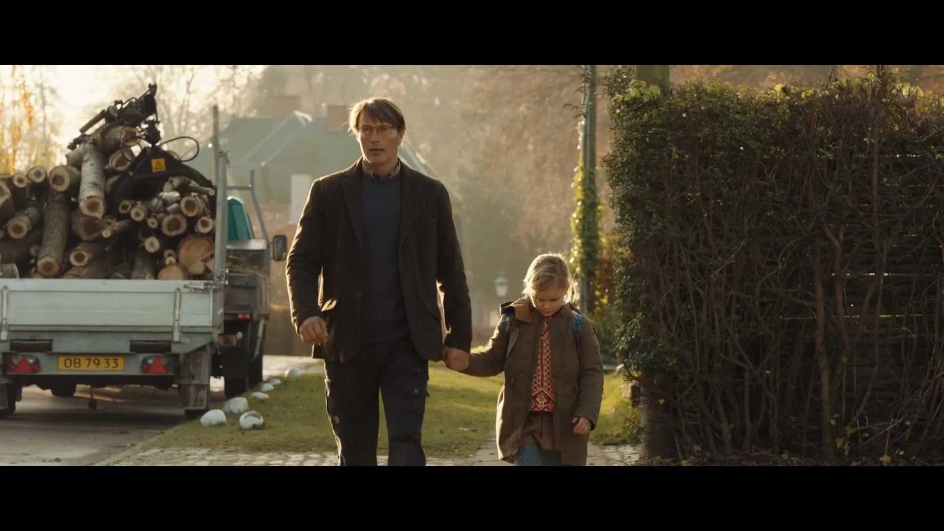 Mads Mikkelsen and Annika Wedderkopp in The Hunt (2012)