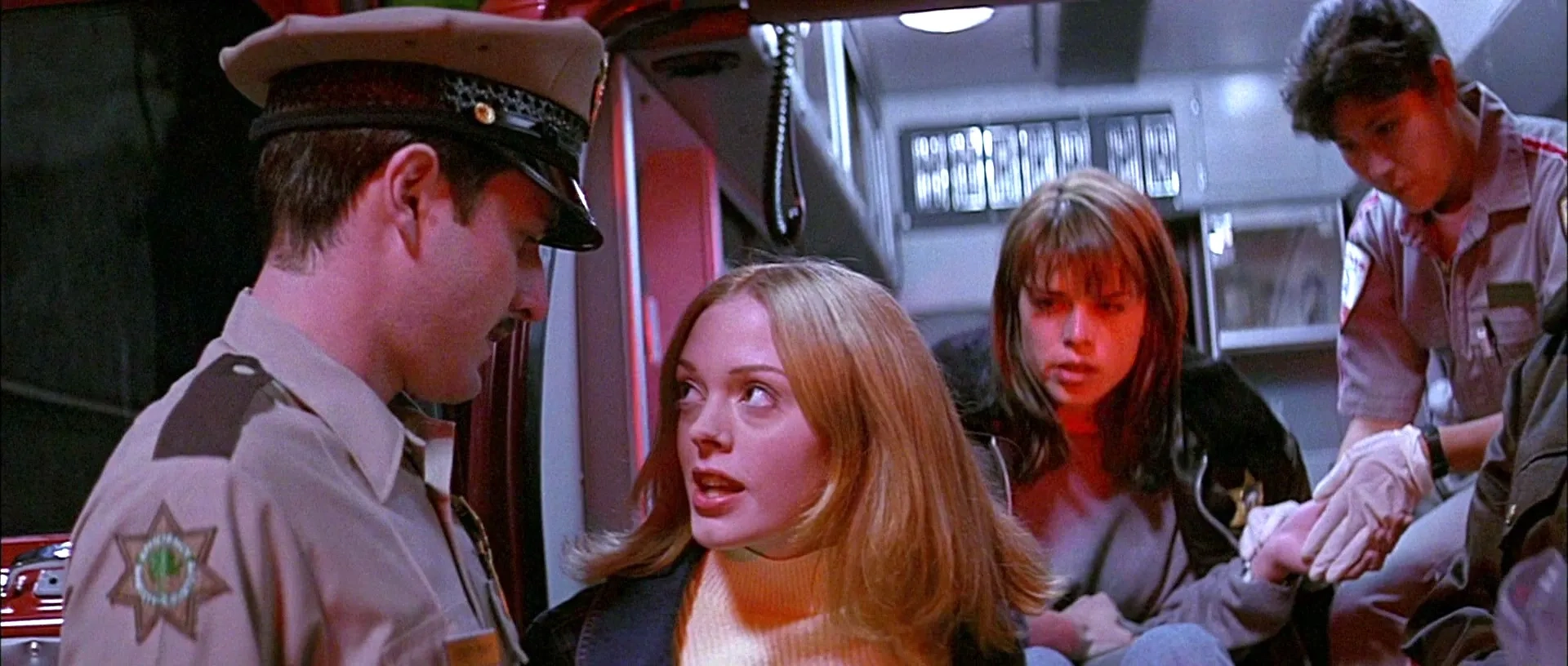 Neve Campbell, David Arquette, and Rose McGowan in Scream (1996)