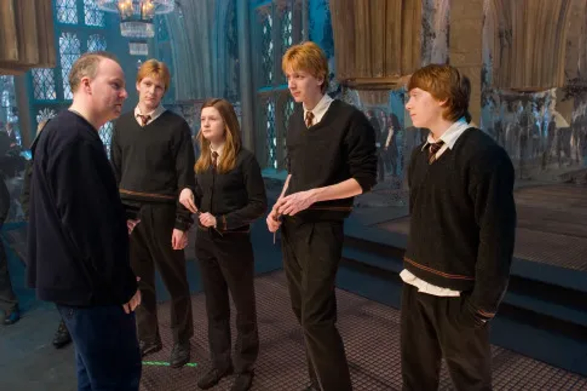 Rupert Grint, Bonnie Wright, David Yates, James Phelps, and Oliver Phelps in Harry Potter and the Order of the Phoenix (2007)