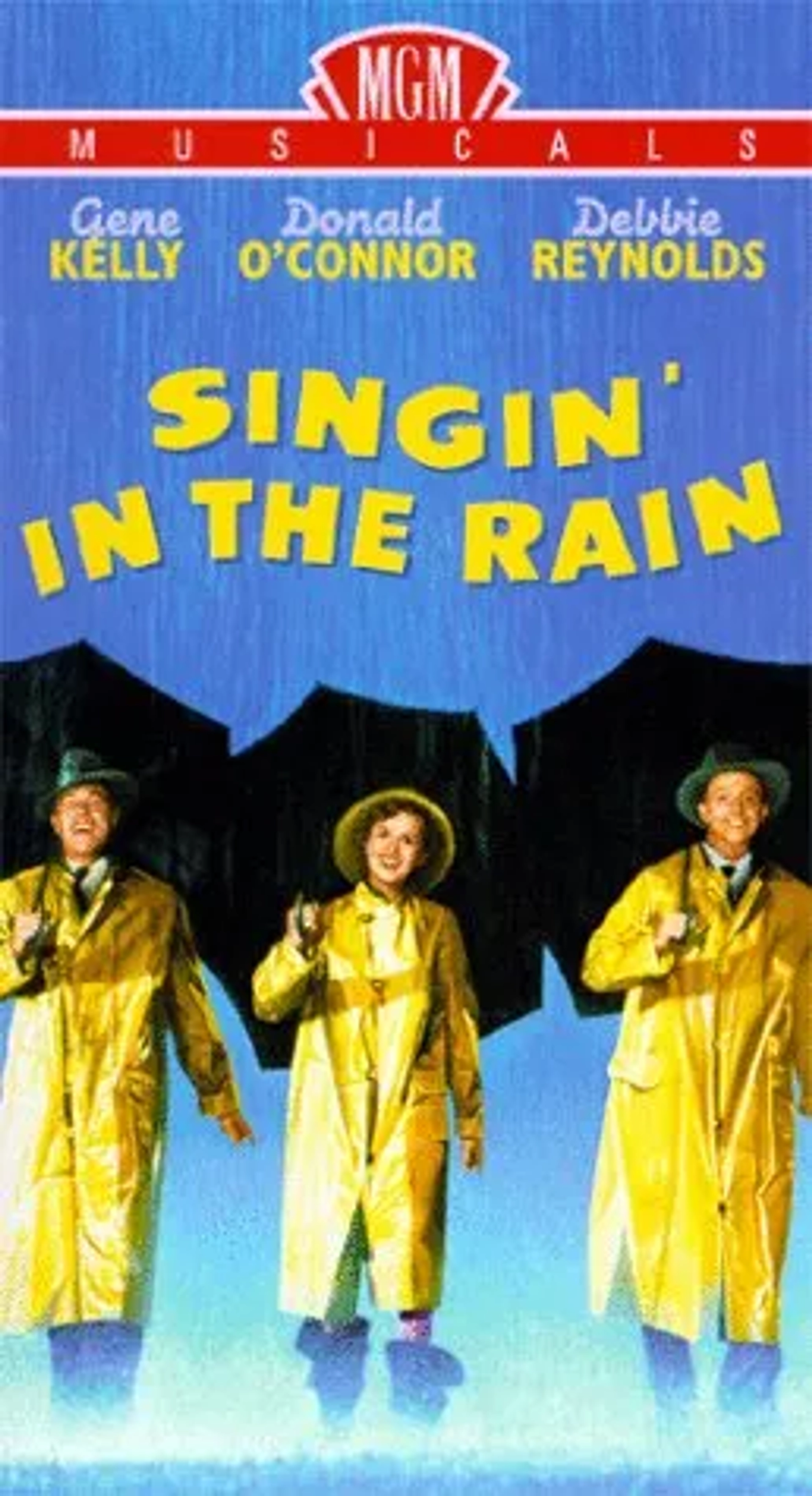 Gene Kelly, Debbie Reynolds, and Donald O'Connor in Singin' in the Rain (1952)