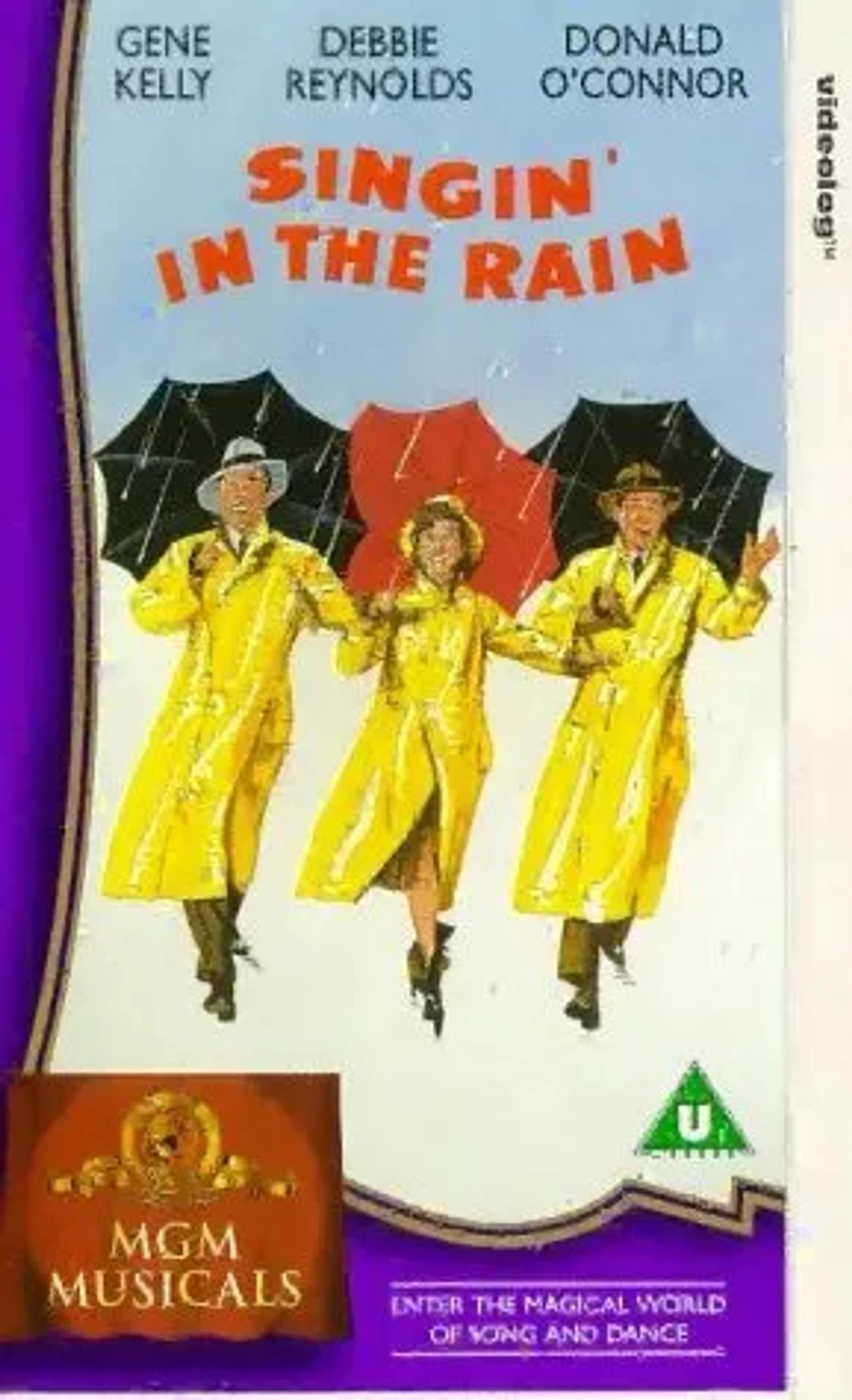 Gene Kelly, Debbie Reynolds, and Donald O'Connor in Singin' in the Rain (1952)