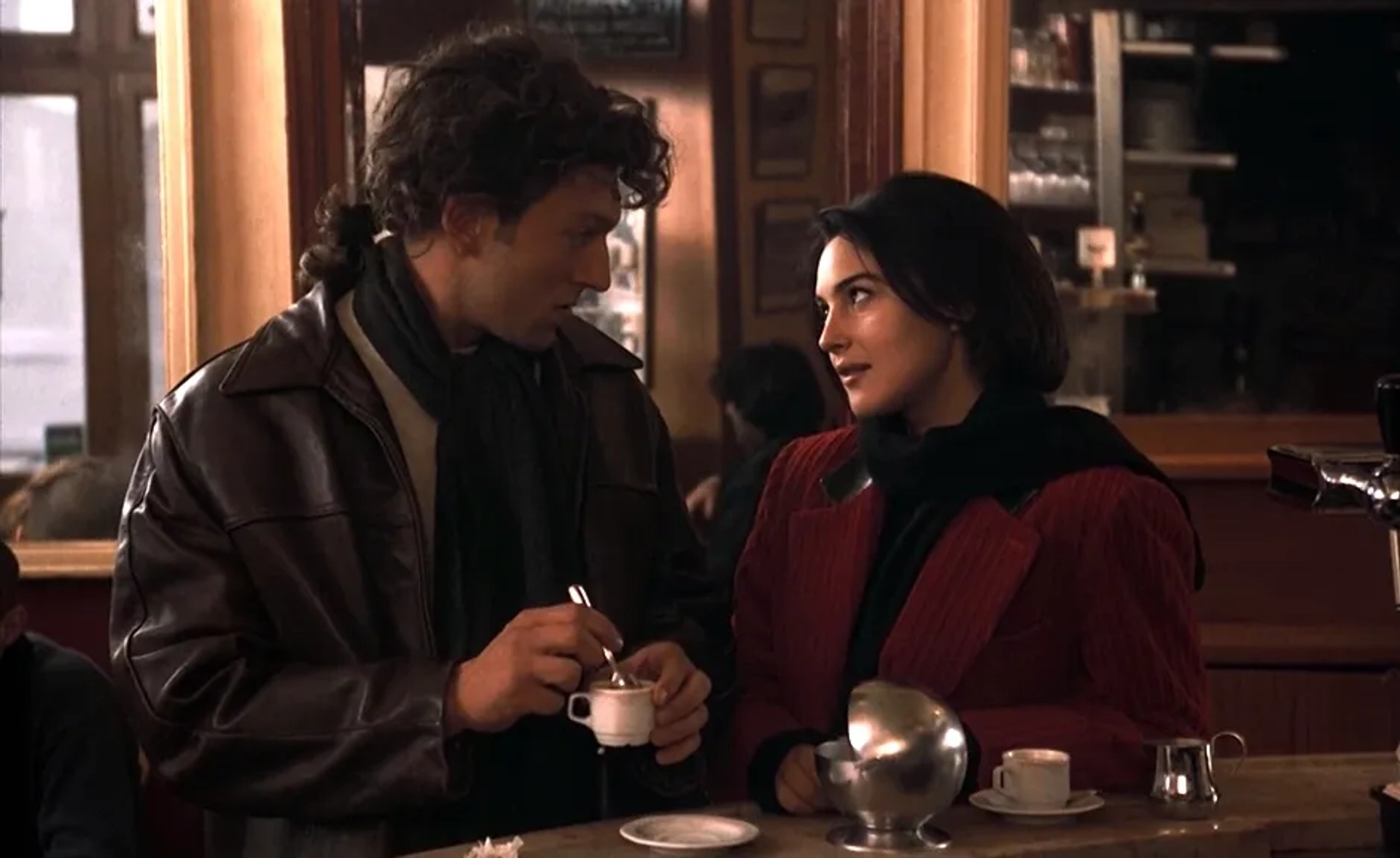 Monica Bellucci and Vincent Cassel in The Apartment (1996)