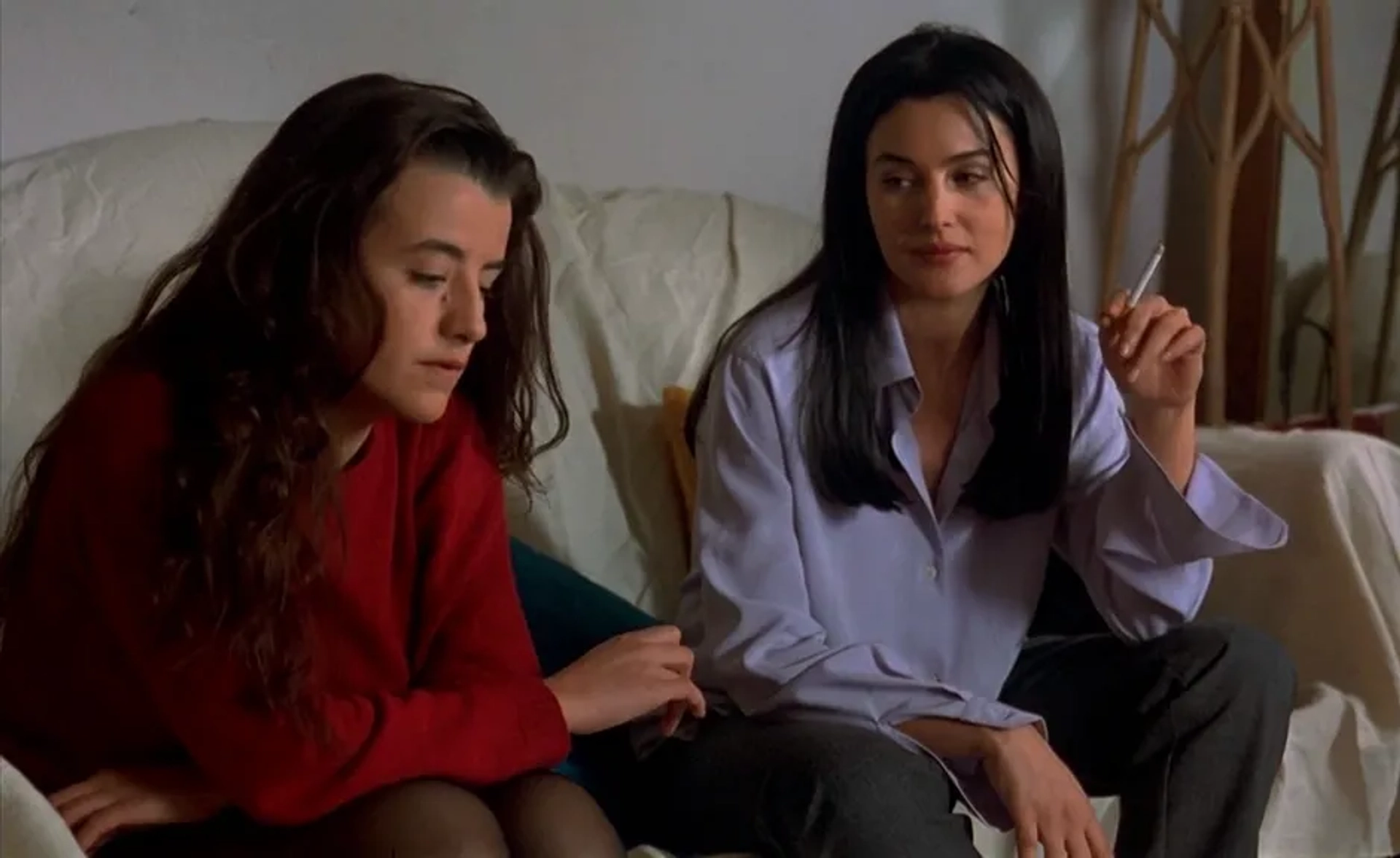 Monica Bellucci and Romane Bohringer in The Apartment (1996)