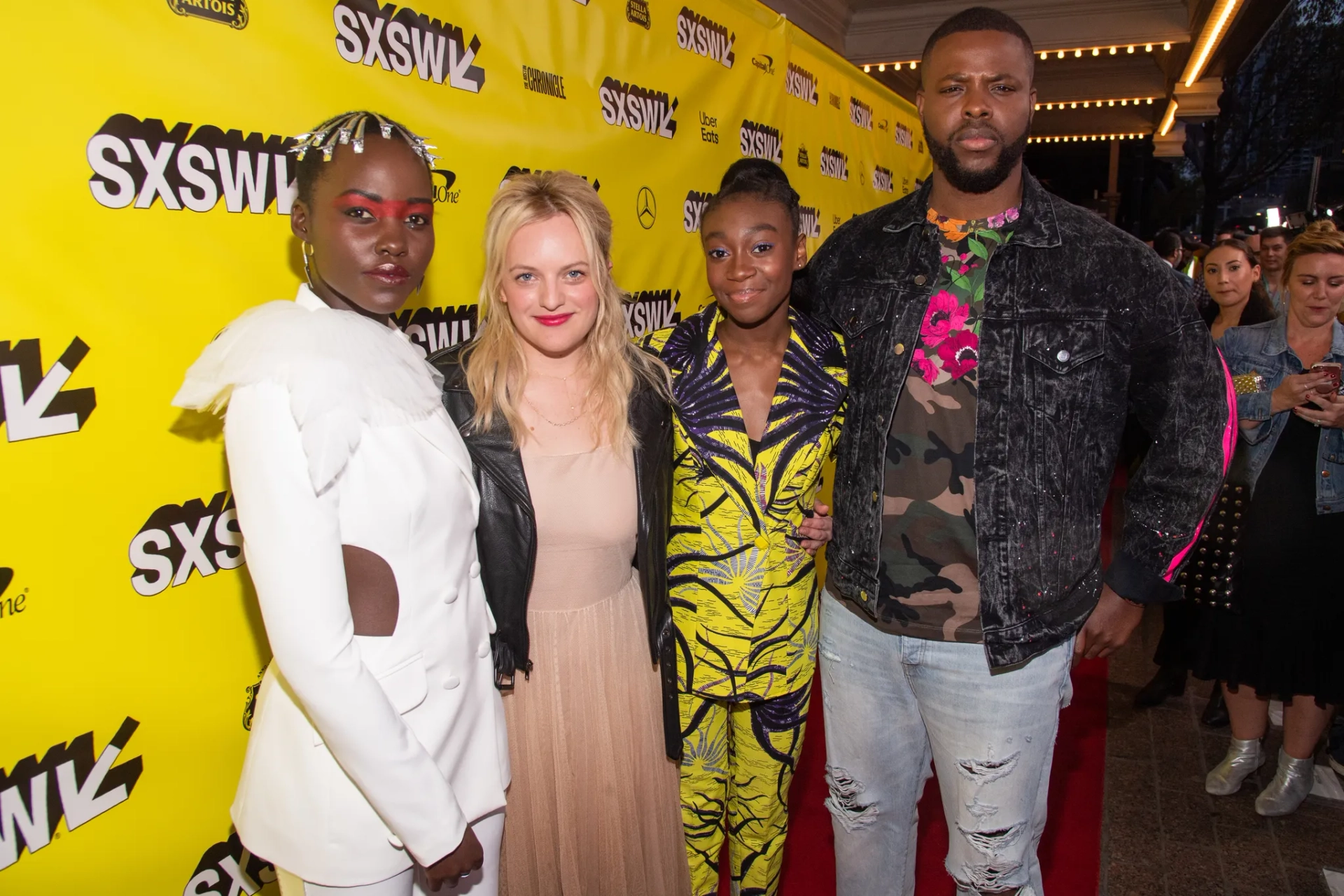 Elisabeth Moss, Lupita Nyong'o, Winston Duke, and Shahadi Wright Joseph at an event for Us (2019)