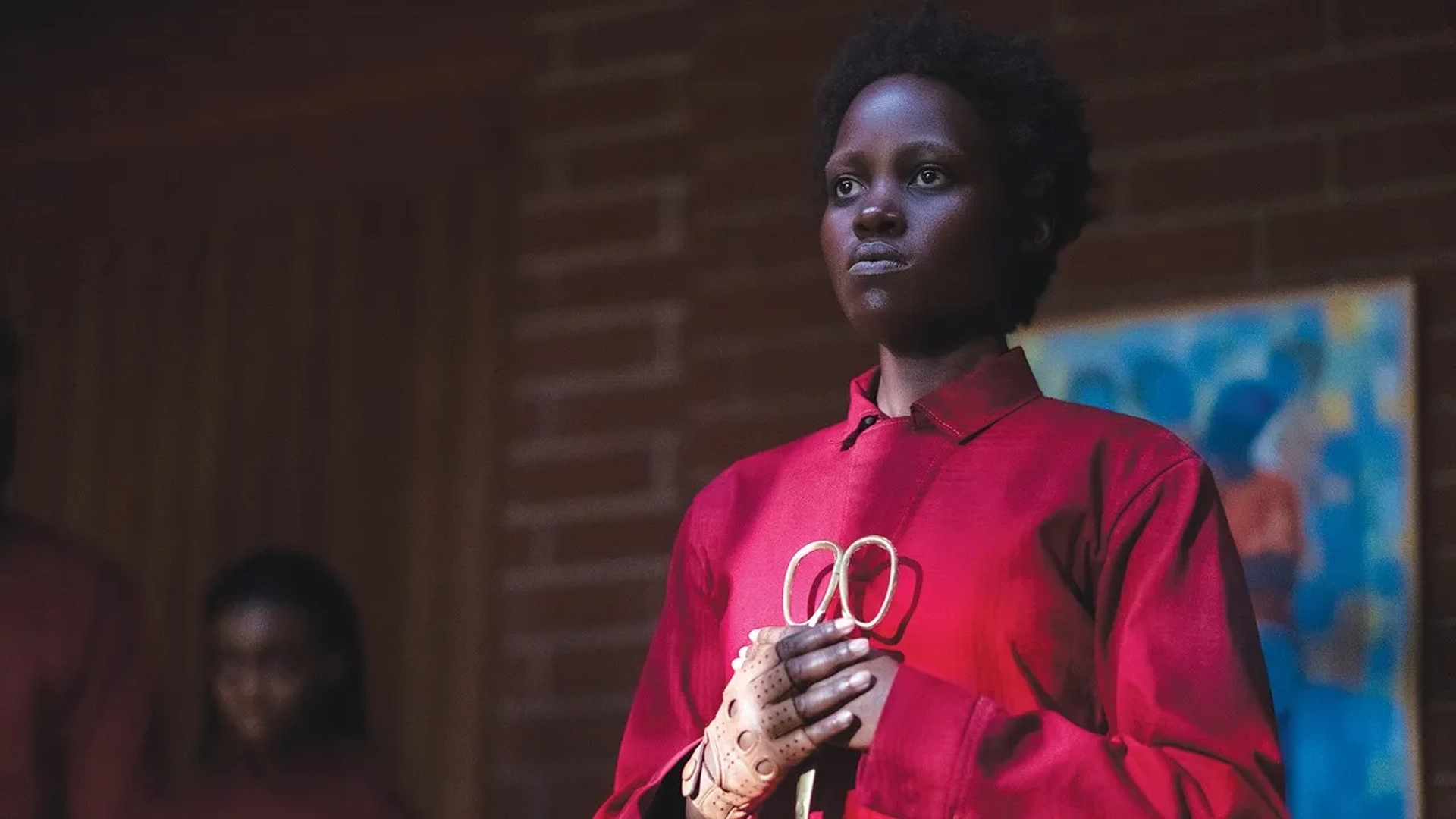 Lupita Nyong'o, Winston Duke, and Shahadi Wright Joseph in Us (2019)