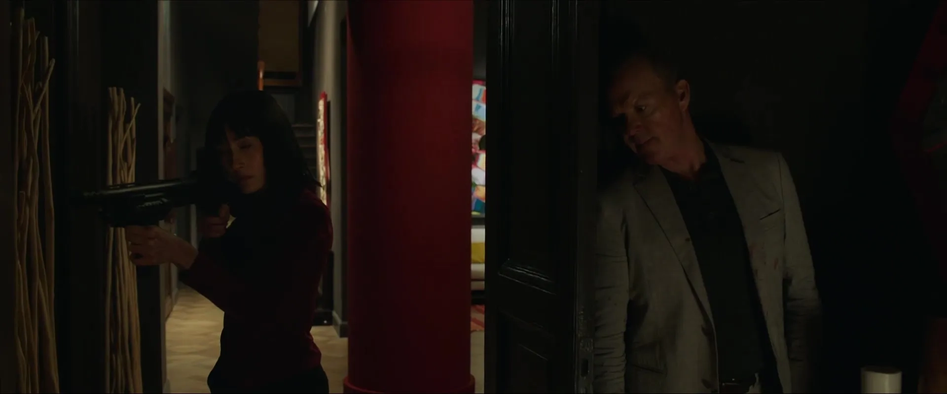 Michael Keaton and Maggie Q in The Protégé (2021)