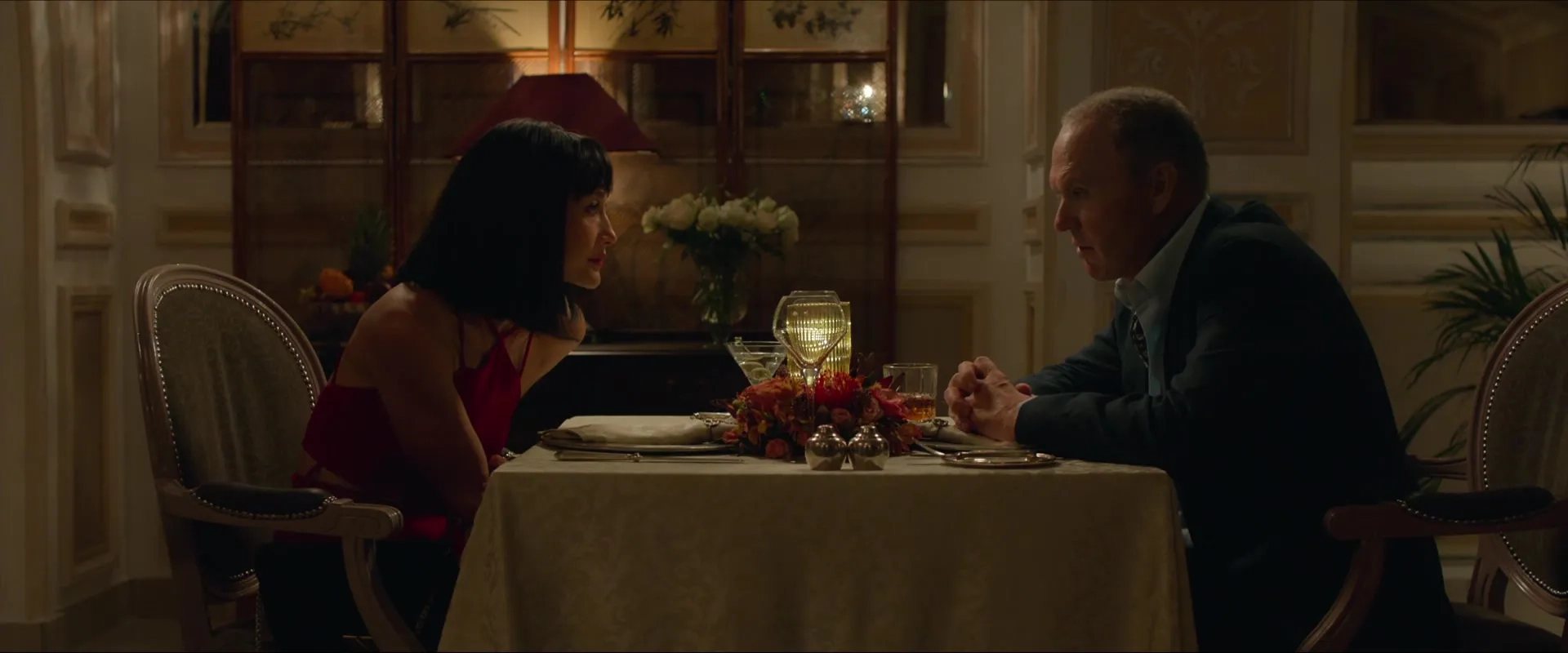 Michael Keaton and Maggie Q in The Protégé (2021)