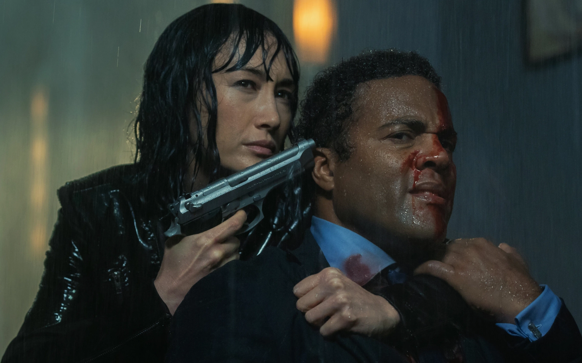 Ray Fearon and Maggie Q in The Protégé (2021)