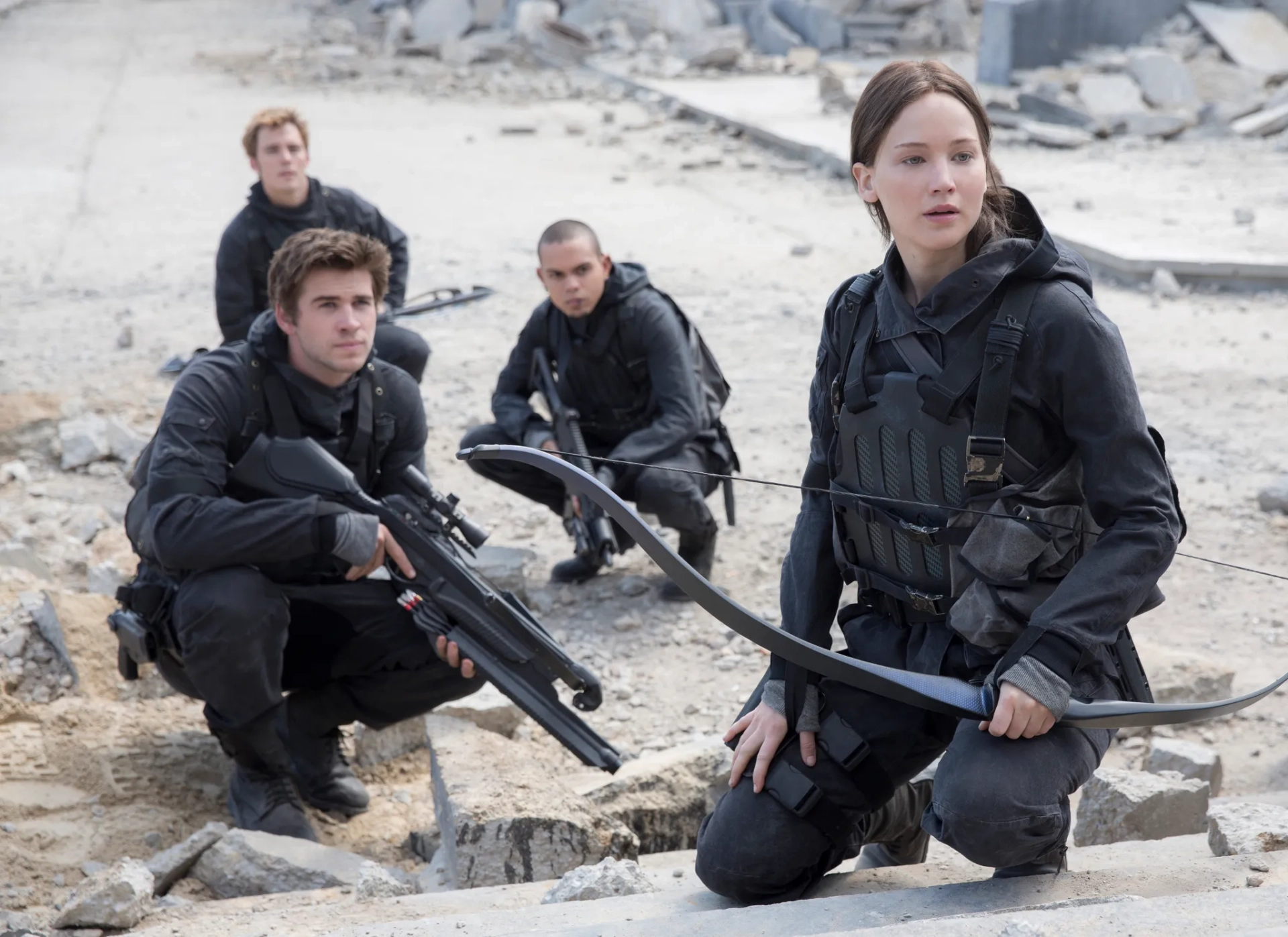 Evan Ross, Jennifer Lawrence, Liam Hemsworth, and Sam Claflin in The Hunger Games: Mockingjay - Part 2 (2015)