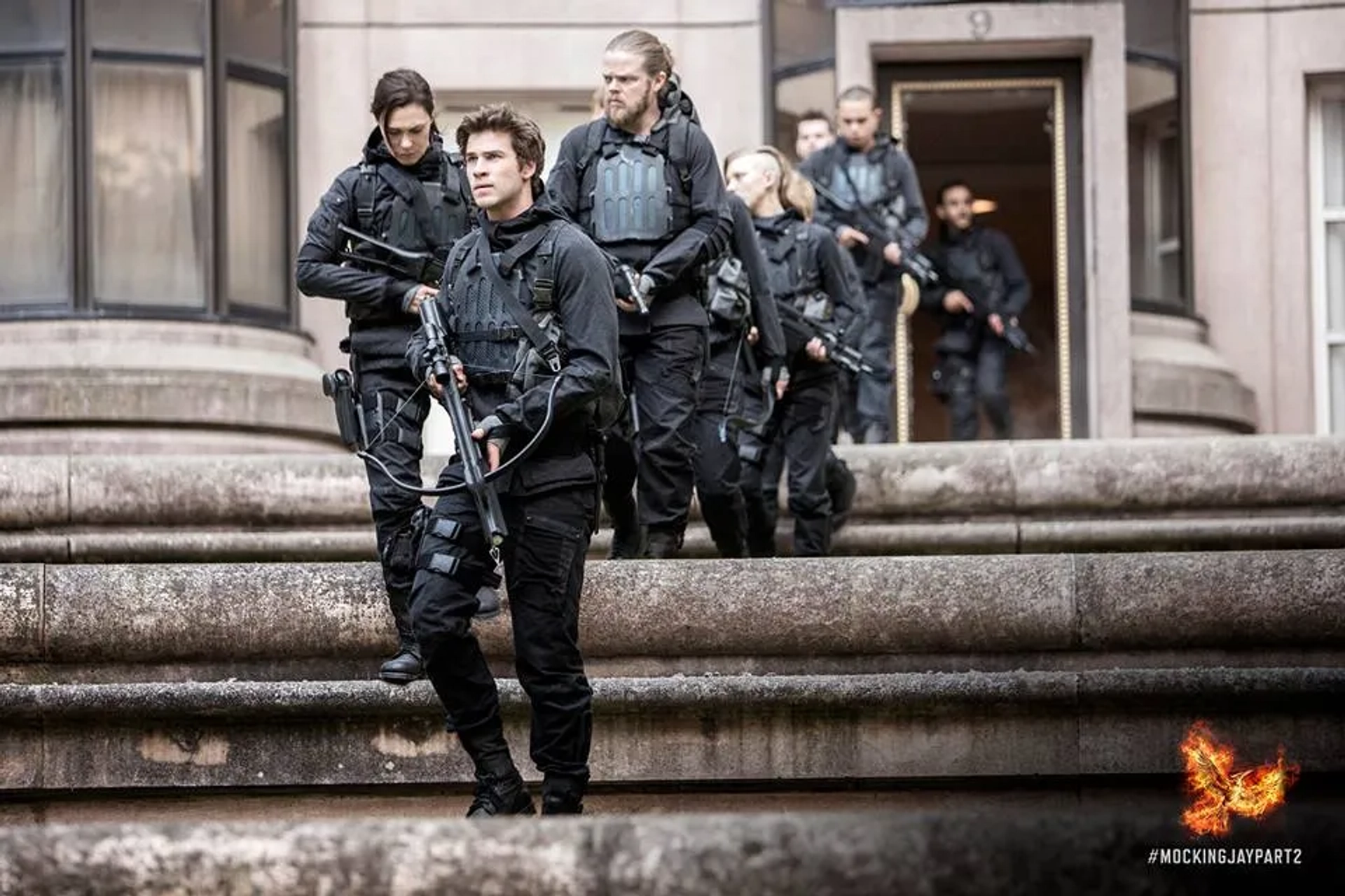 Michelle Forbes, Elden Henson, Natalie Dormer, Evan Ross, and Liam Hemsworth in The Hunger Games: Mockingjay - Part 2 (2015)