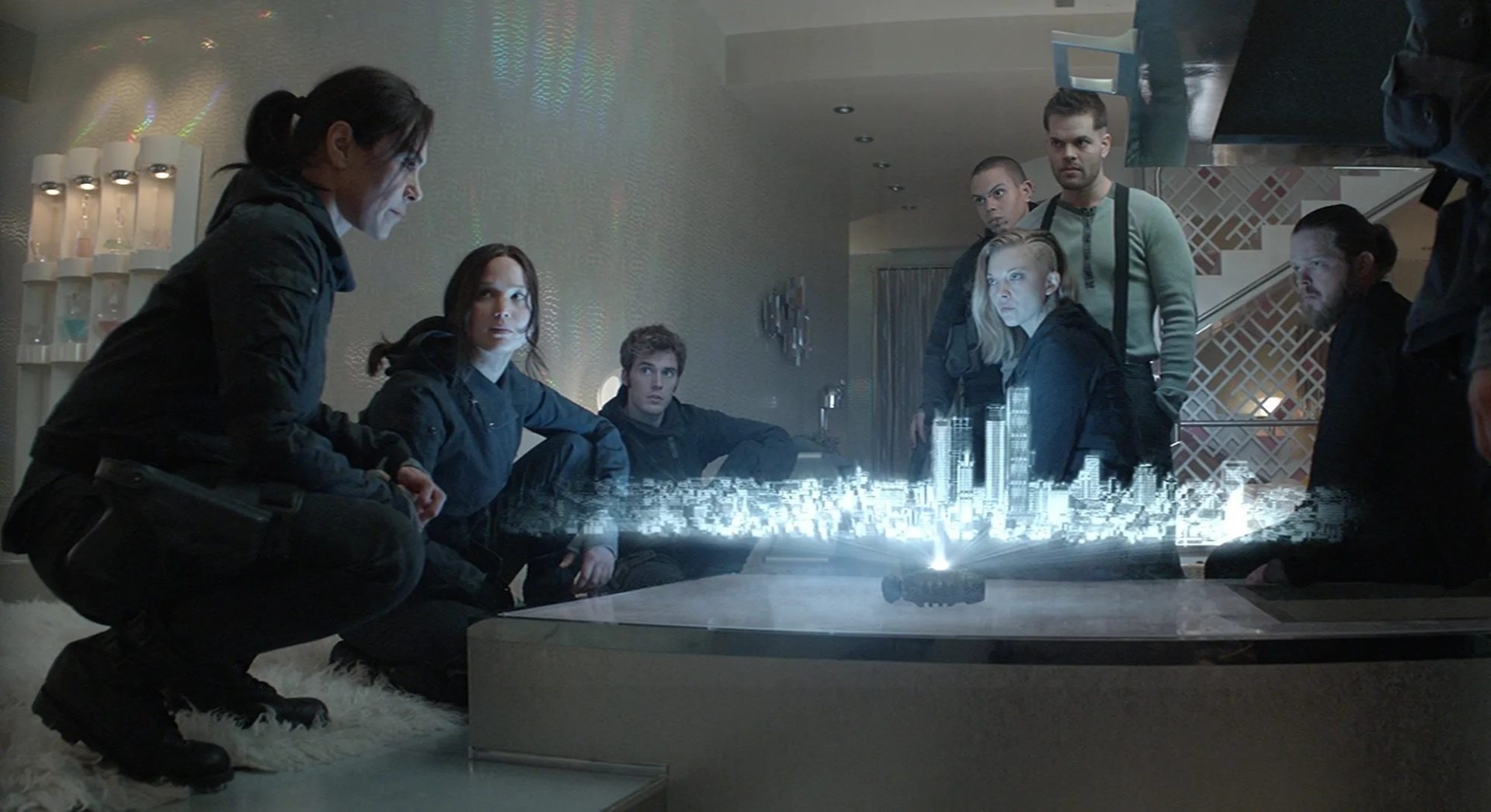 Michelle Forbes, Elden Henson, Wes Chatham, Natalie Dormer, Evan Ross, Jennifer Lawrence, and Sam Claflin in The Hunger Games: Mockingjay - Part 2 (2015)