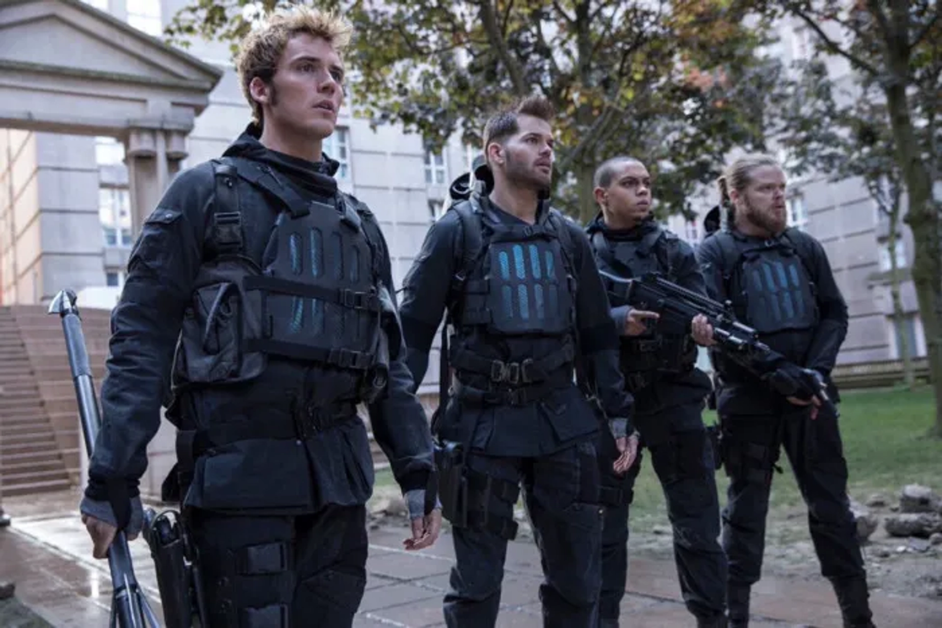 Elden Henson, Wes Chatham, Evan Ross, and Sam Claflin in The Hunger Games: Mockingjay - Part 2 (2015)