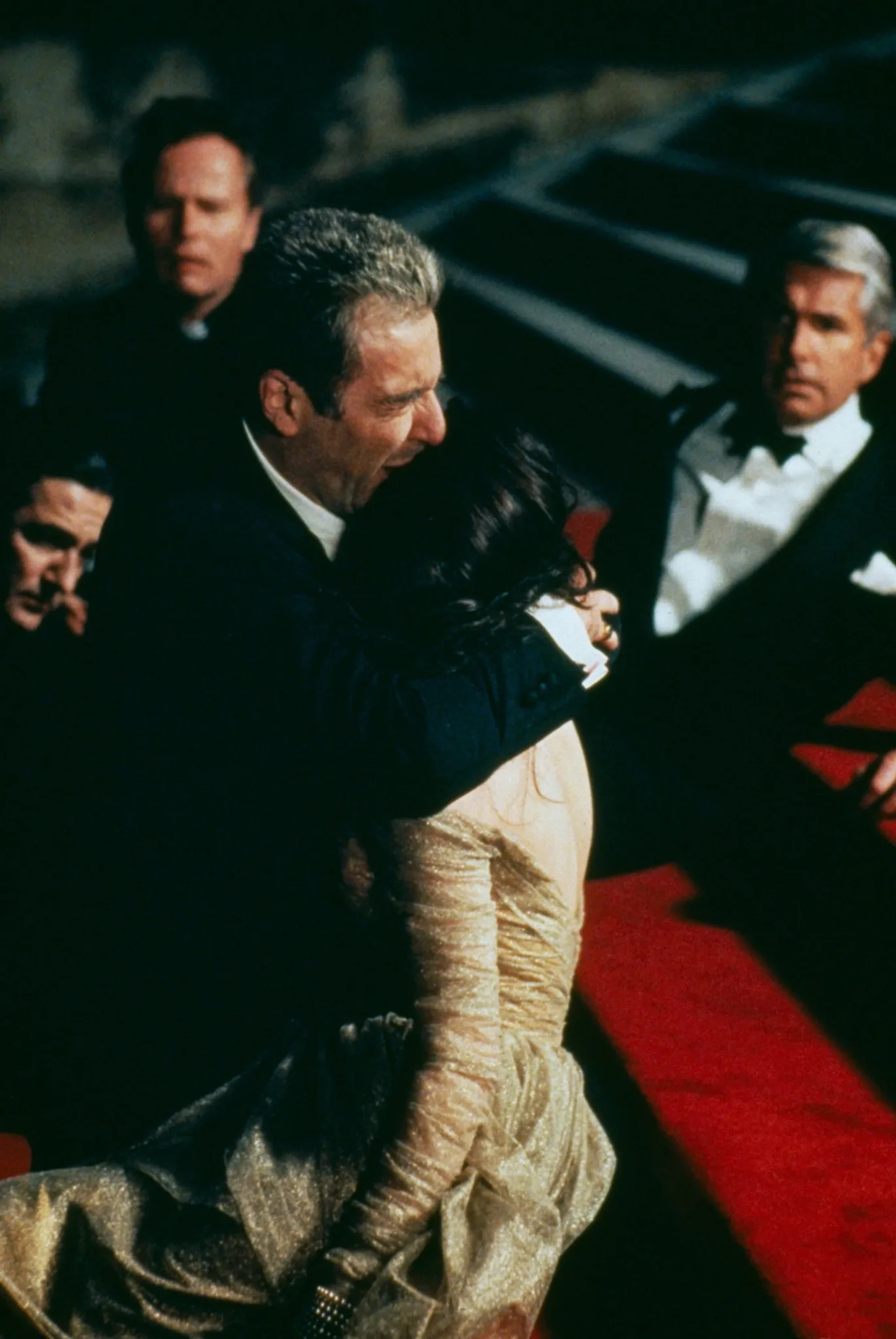 Al Pacino, Sofia Coppola, George Hamilton, and John Savage in The Godfather Part III (1990)