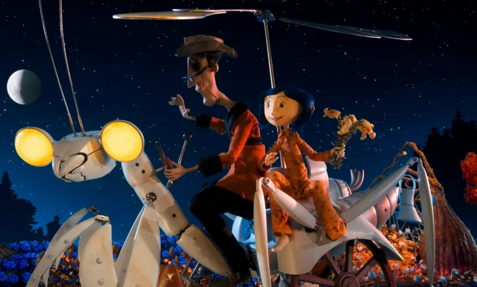 Dakota Fanning and John Hodgman in Coraline (2009)