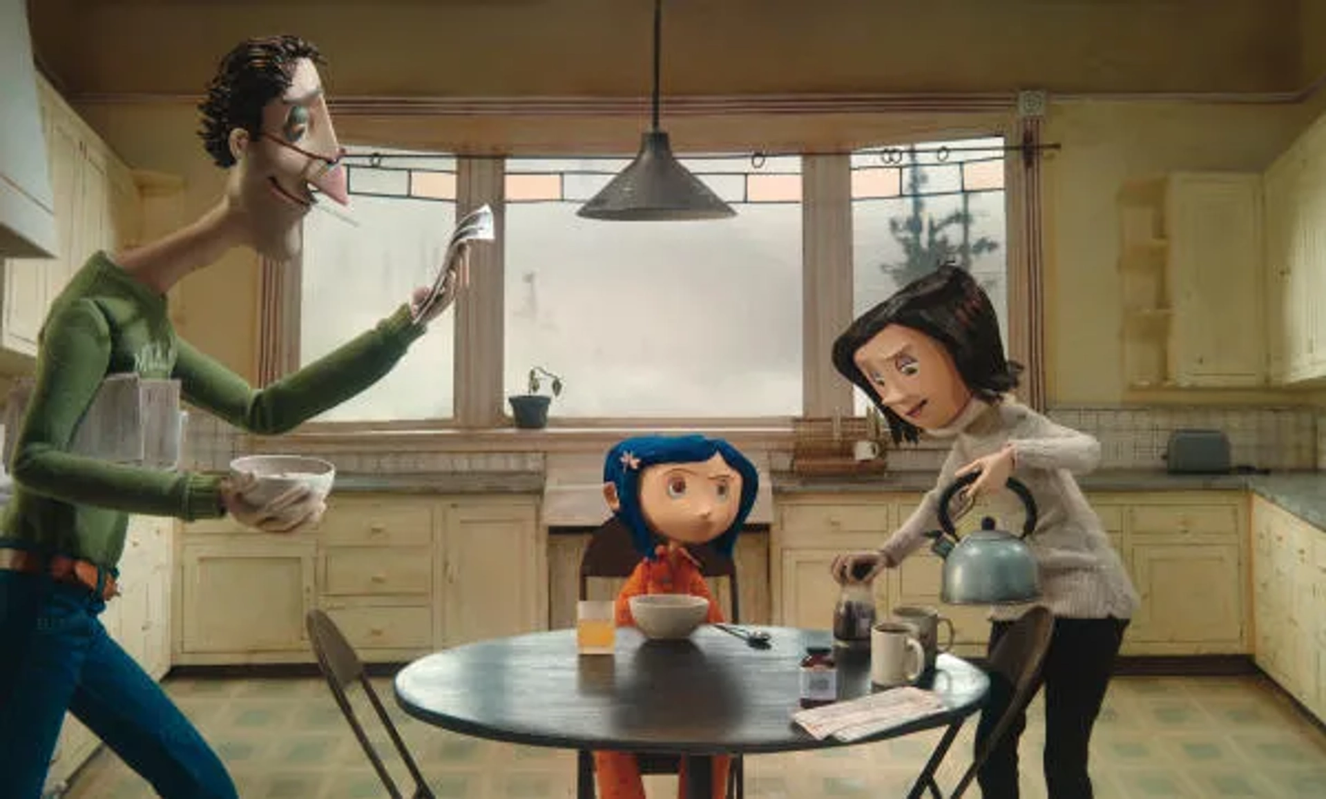 Teri Hatcher, Dakota Fanning, and John Hodgman in Coraline (2009)