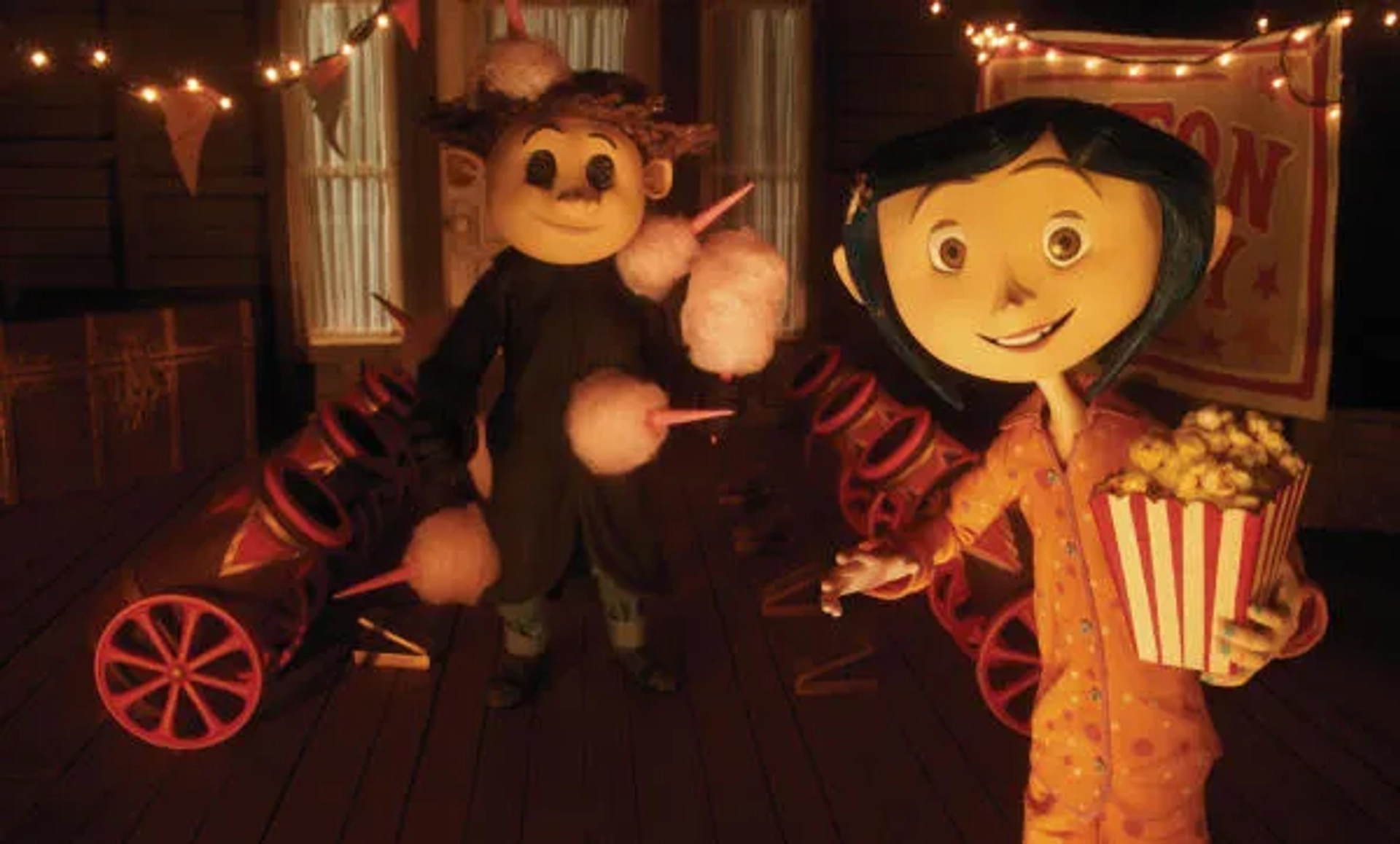 Robert Bailey Jr. and Dakota Fanning in Coraline (2009)