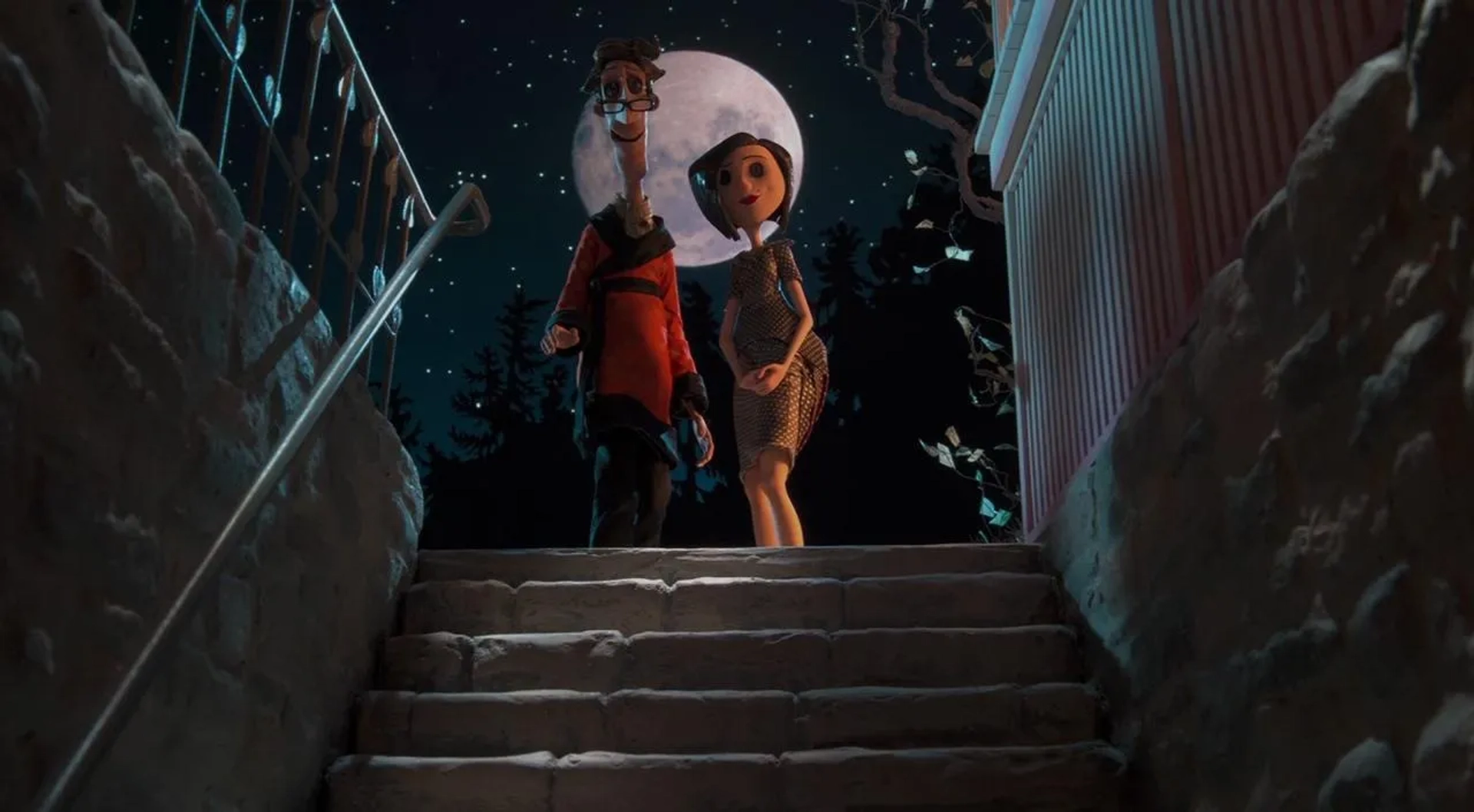 Teri Hatcher and John Hodgman in Coraline (2009)