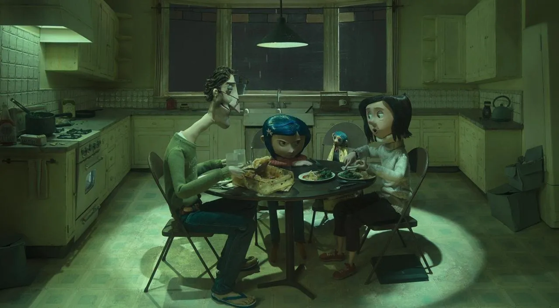 Teri Hatcher, Dakota Fanning, and John Hodgman in Coraline (2009)